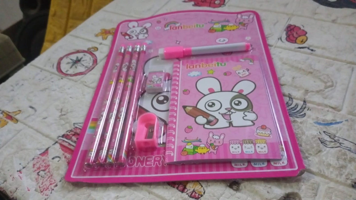Close-up of wooden pencils, sharpener, eraser, and diary from the Kids' Stationery Kit.