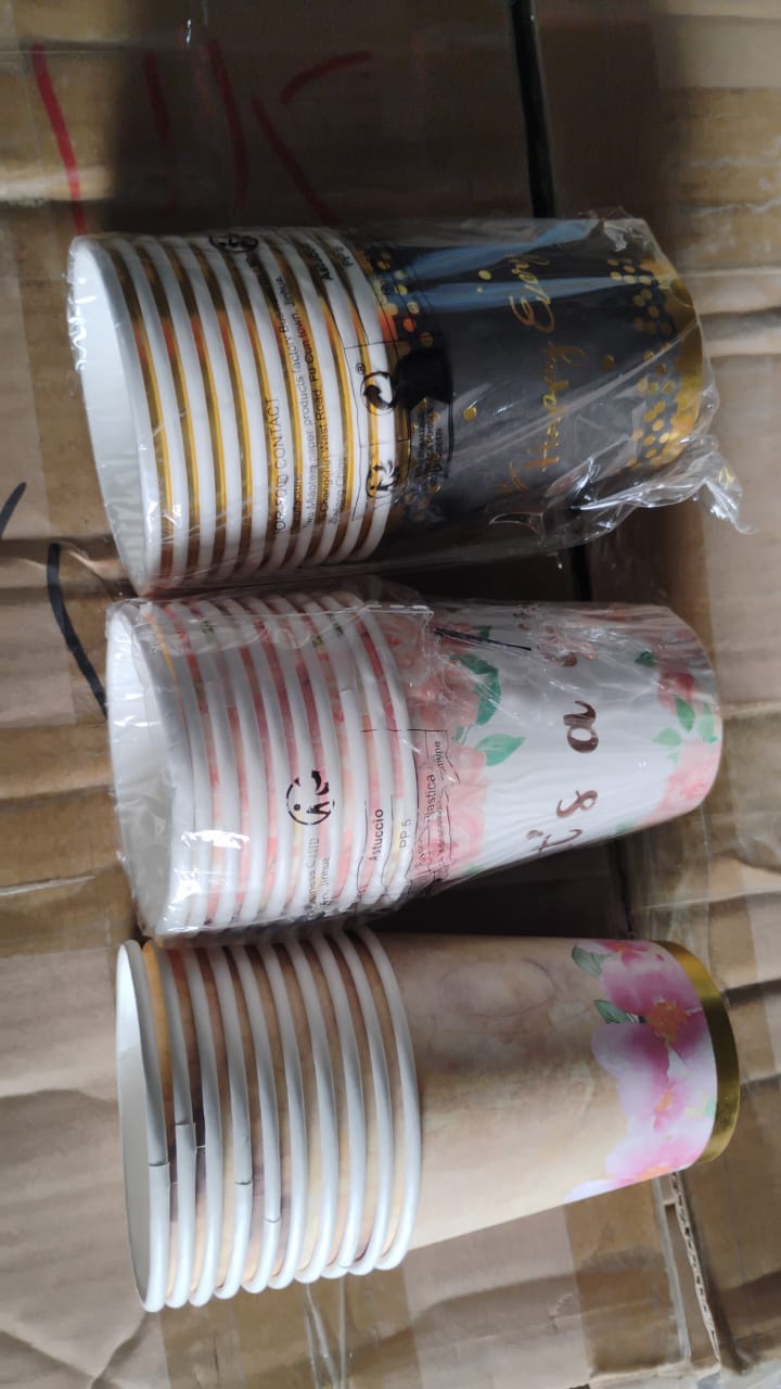 Variety of disposable paper cups for hot and cold drinks.