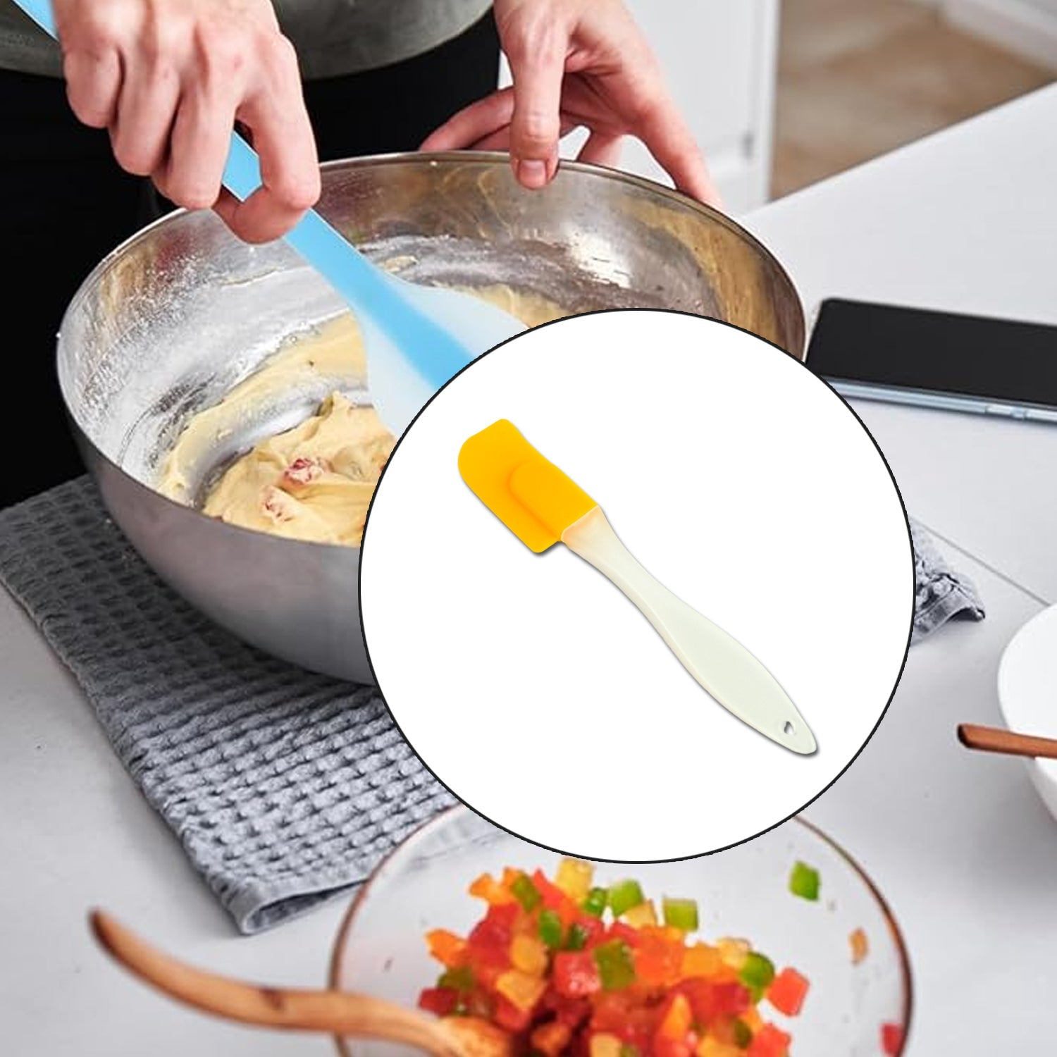 Silicone cooking spatula angled view showing handle and spatula head