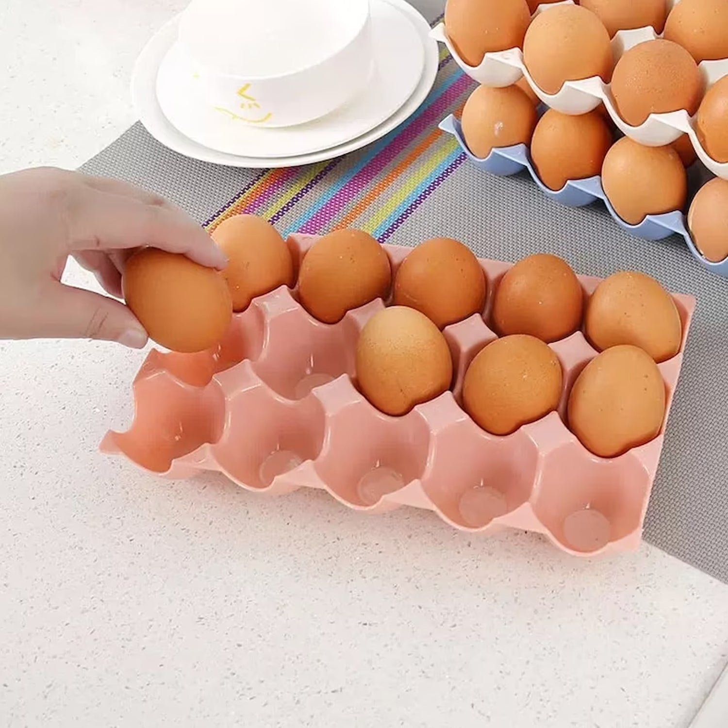 The 15 egg storage tray neatly placed inside a refrigerator shelf.