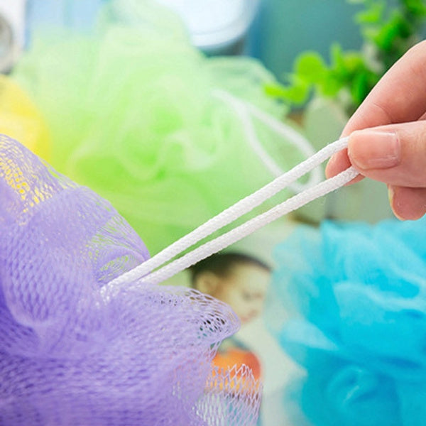Gentle bath loofah and back scrubber for comprehensive body care.