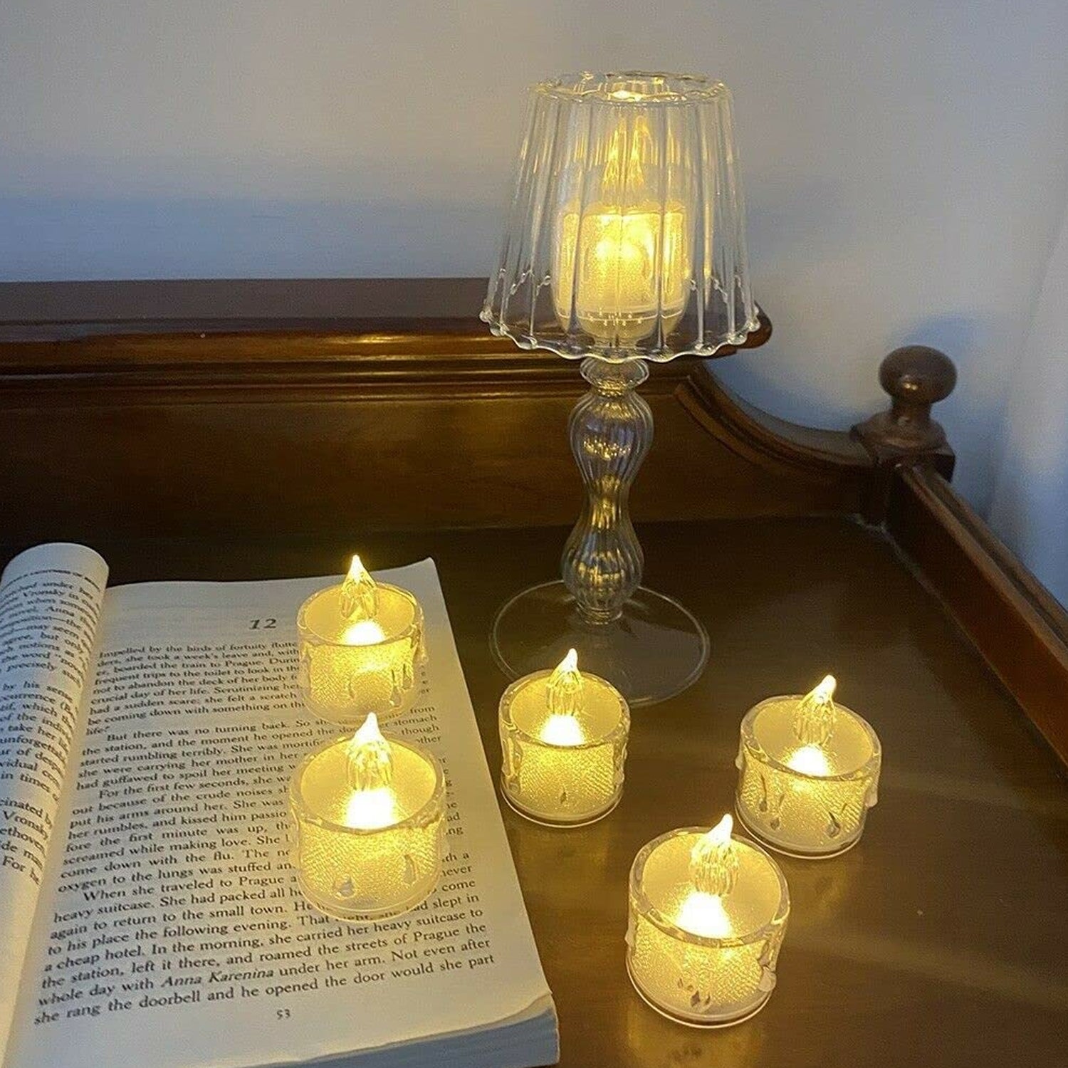 Packaging of 12 Giftoiza flameless LED tea light candles, ready for gifting or decor.