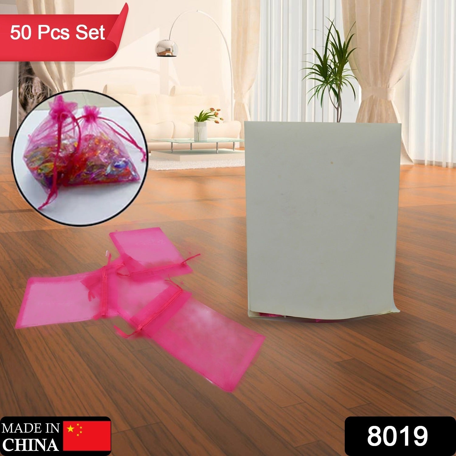 Multiple empty organza drawstring pouches laid flat, highlighting their delicate mesh texture.