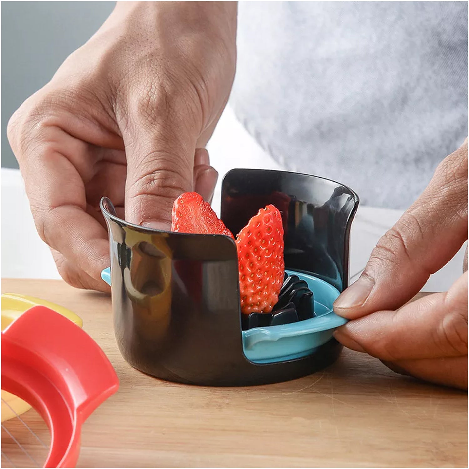 Multifunctional slicer in action, creating perfect slices of a hard-boiled egg.