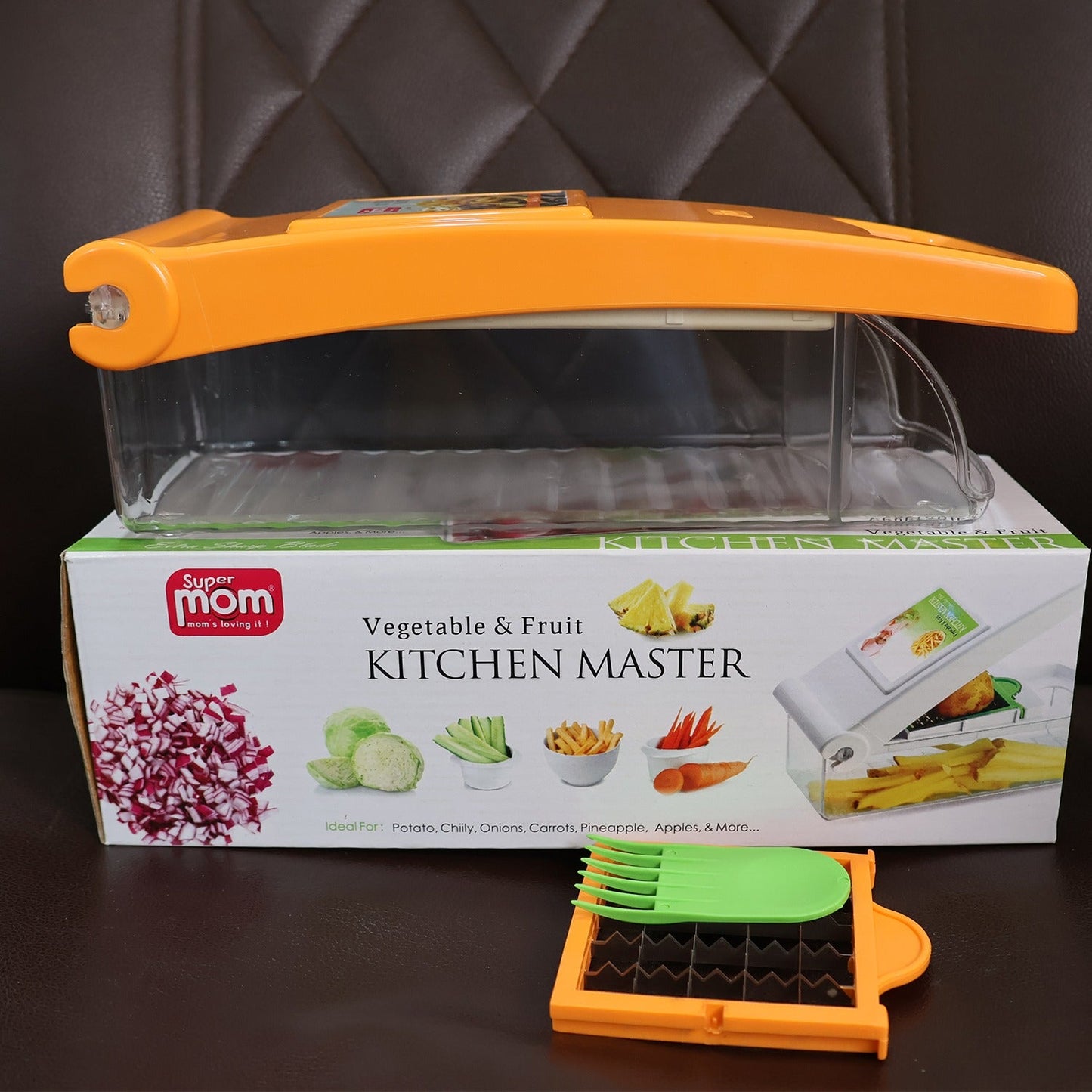 Supermom vegetable and fruit chopper displayed on kitchen counter for easy access