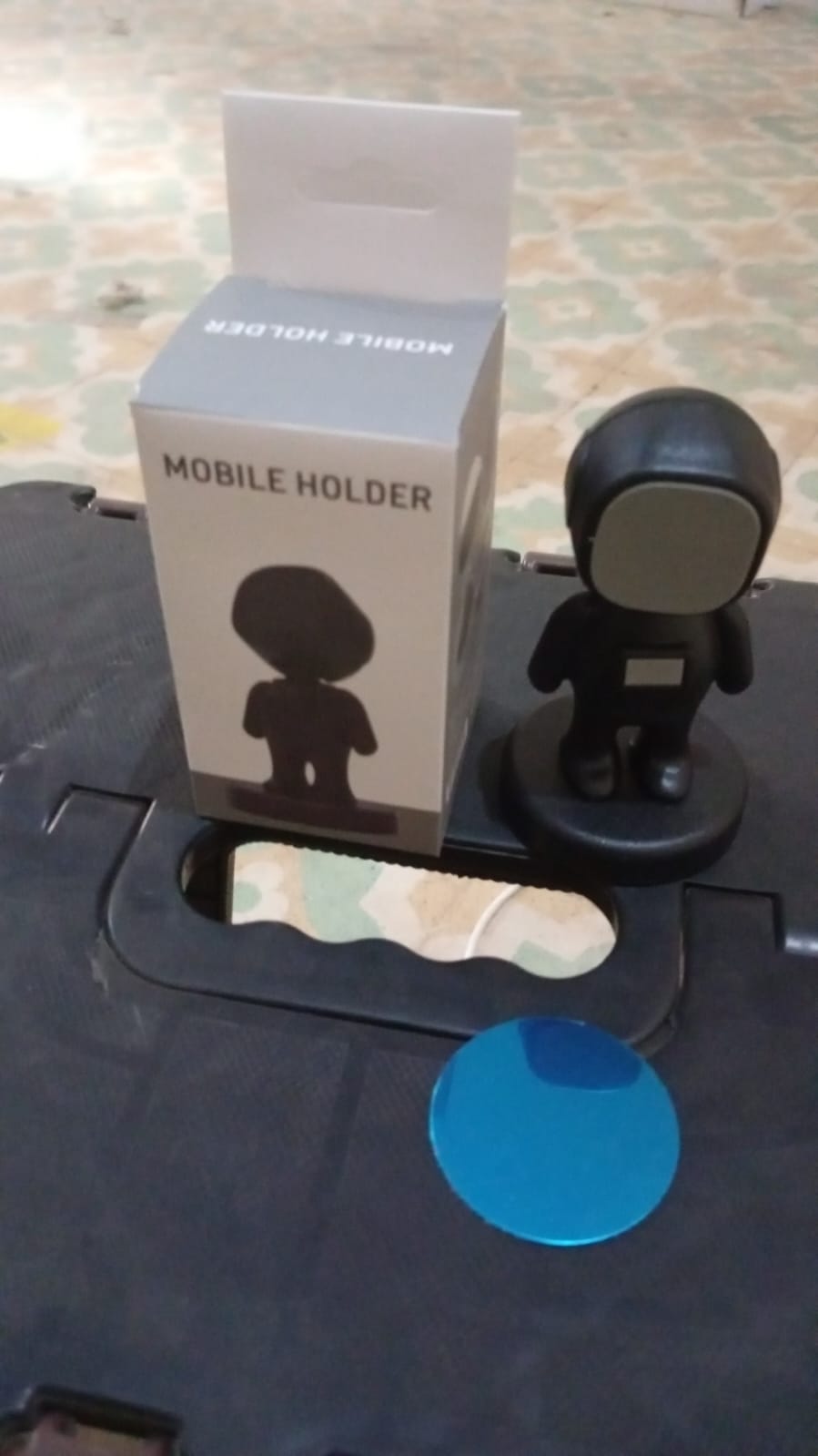 Retail packaging for the Cartoon Astronaut Magnetic Phone Holder.