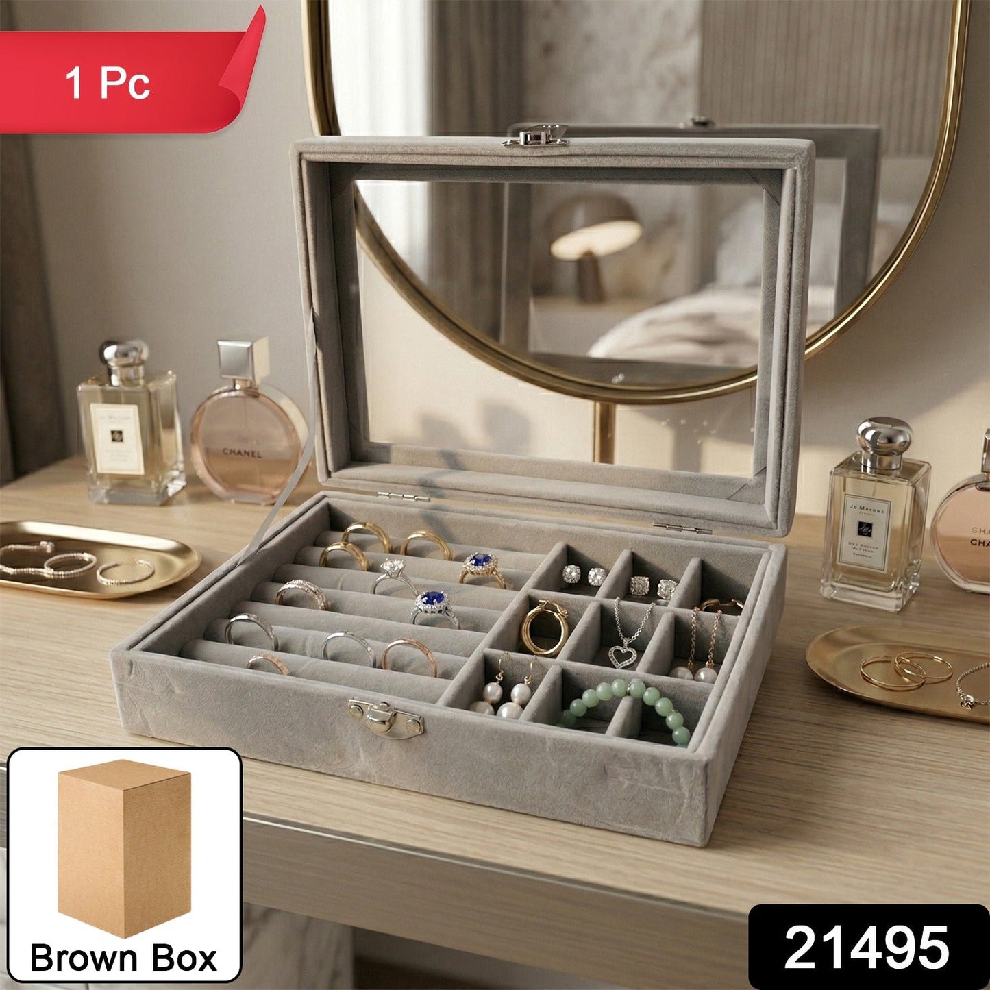 Open velvet jewellery box showing ring and earring storage sections