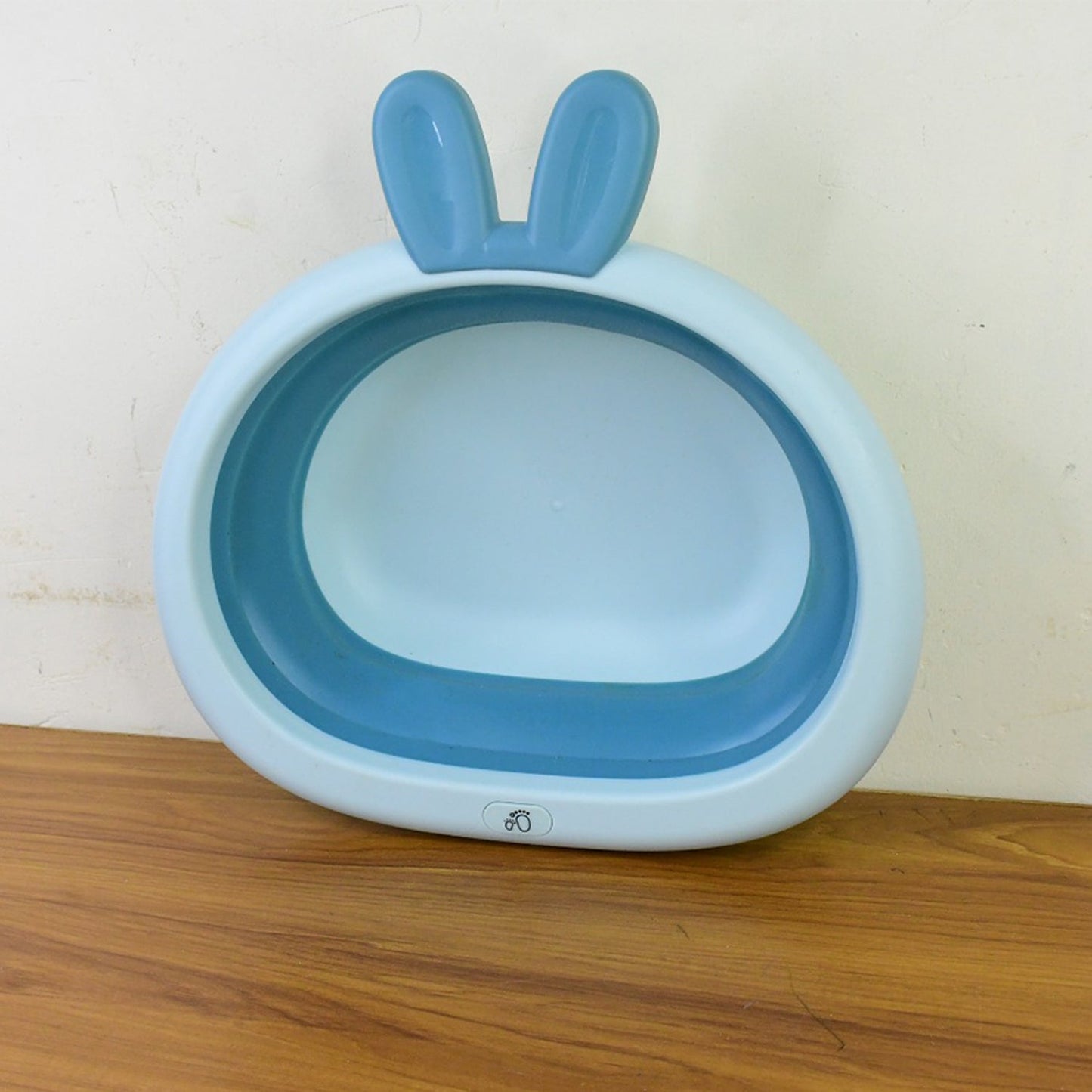 Durable collapsible basin with playful bunny ear handle design