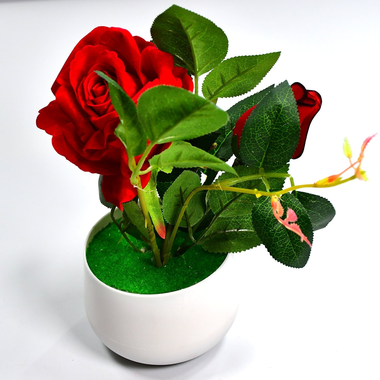 Stylish artificial rose plant serving as a charming home office gift.