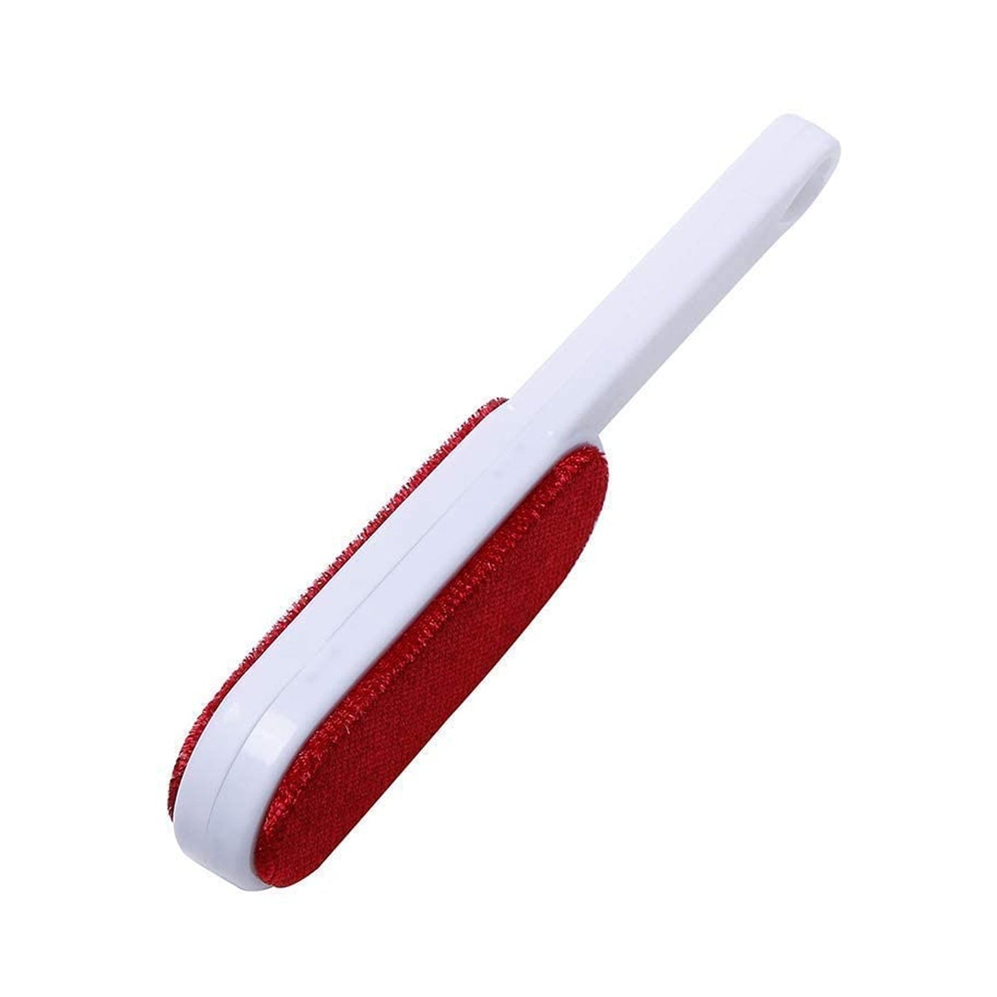Multi-purpose pet fur remover brush effectively cleaning a pet bed.