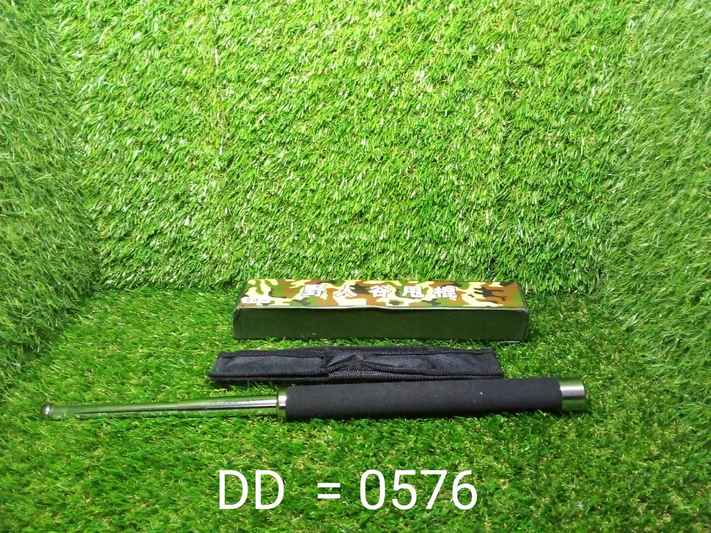 Side view of the collapsible self-defense stick fully extended.