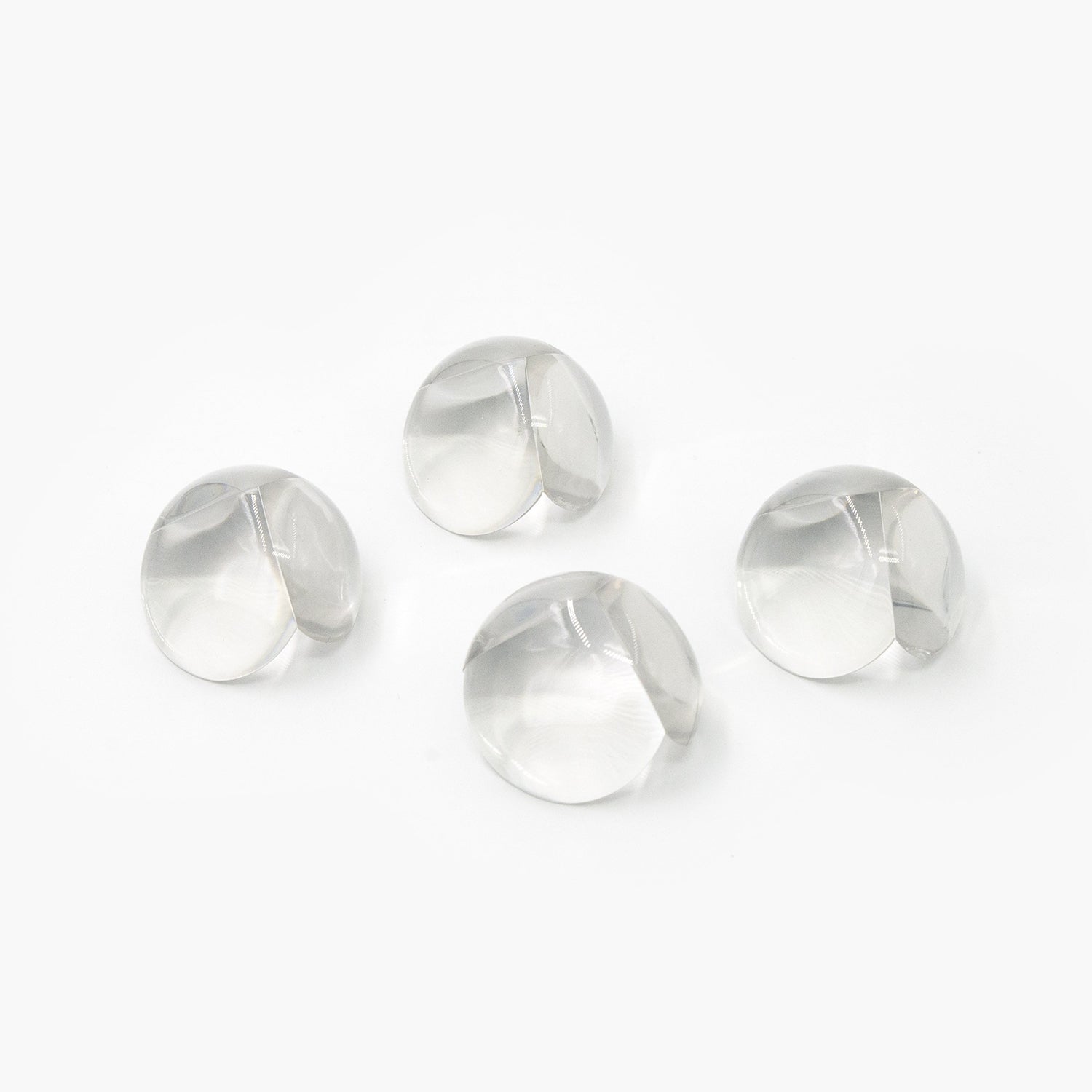 Effective clear corner protectors on a table edge, pack of 4.