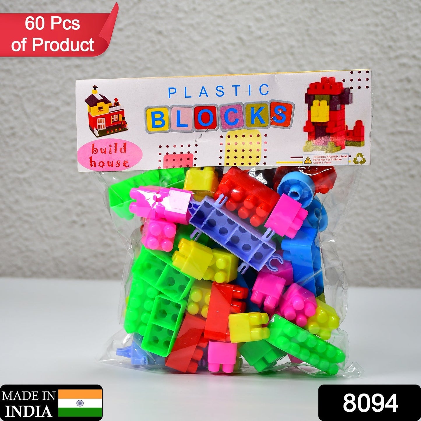A child happily building with the Little Blocks 60-piece kids' block set.