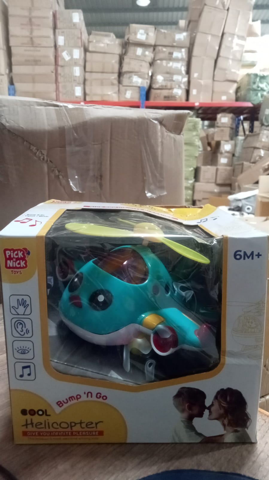 Blue electronic moving toy helicopter with vibrant lights.