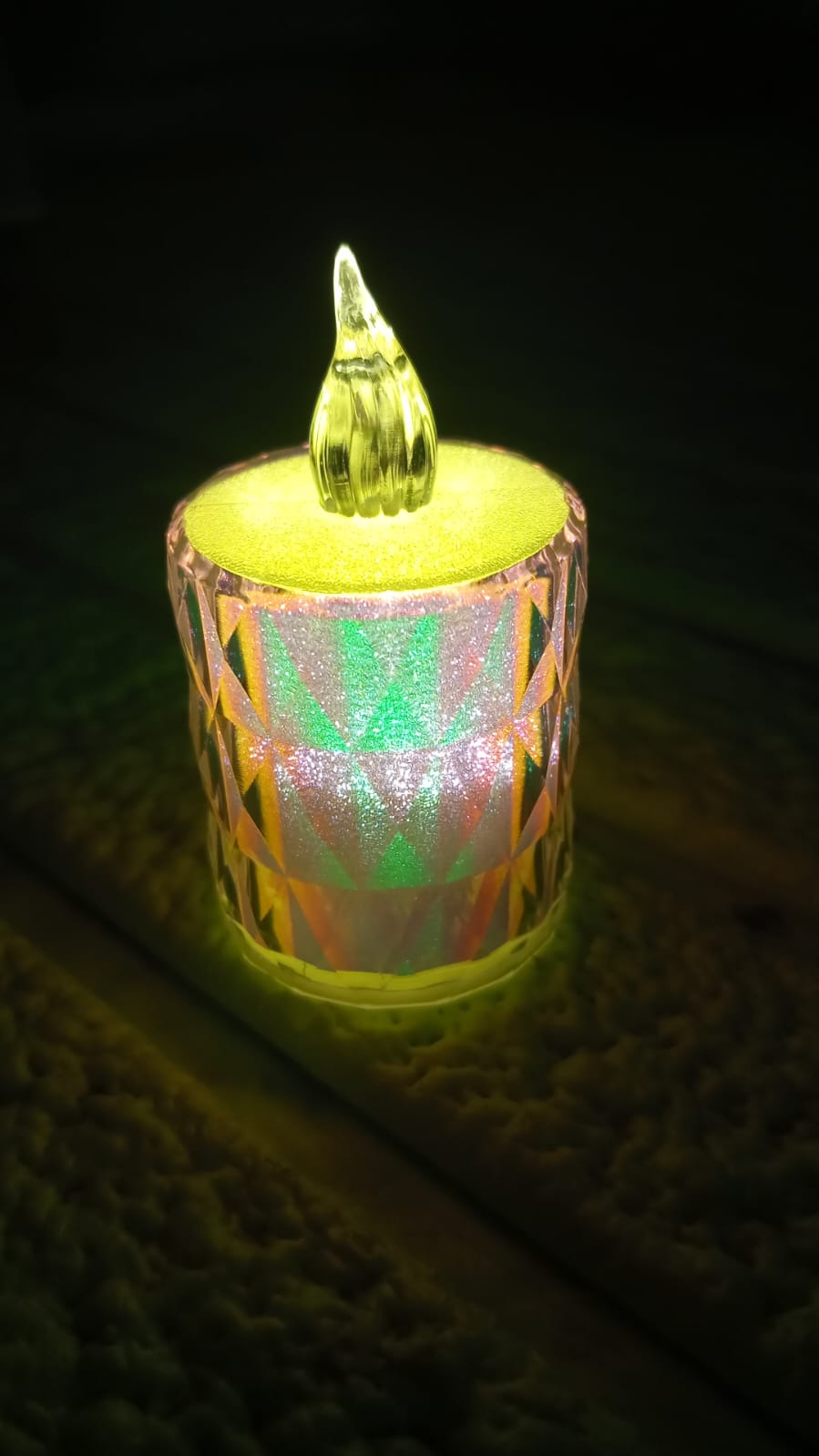 The 4-piece flameless LED candle set displayed in its packaging, ready for gifting.