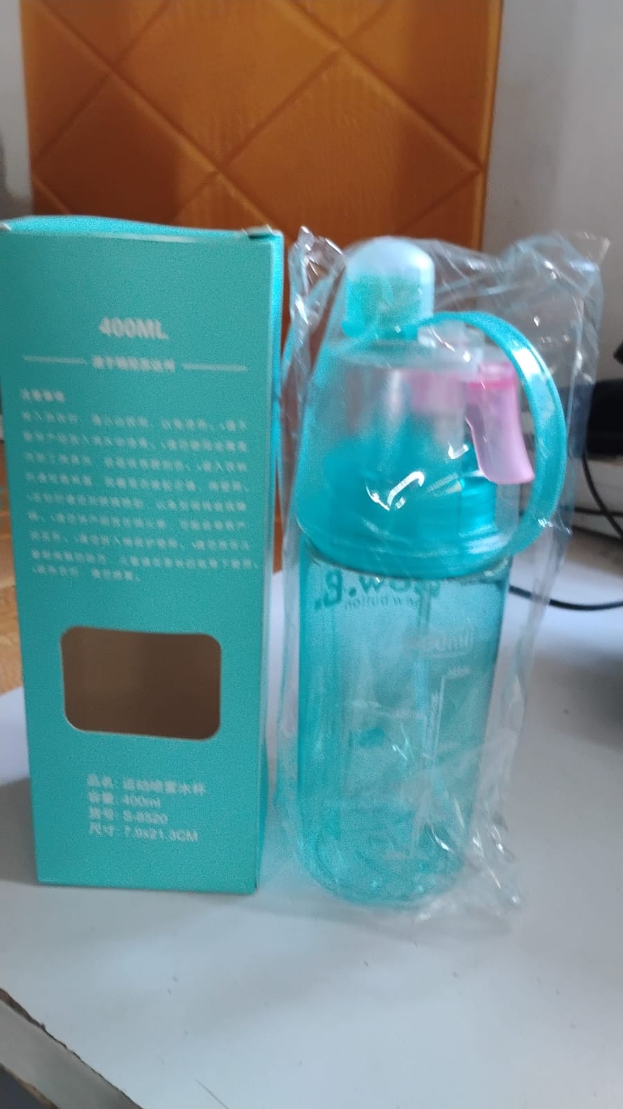 Side profile of 2-in-1 mist spray water bottle highlighting compact size
