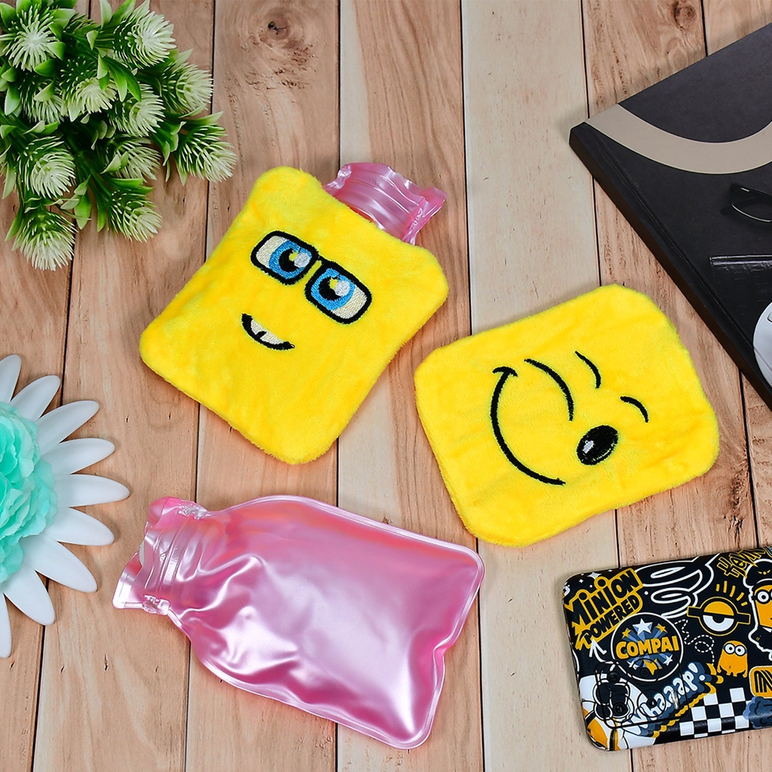 Close-up of a yellow emoji Mini Hot Water Bag, highlighting its soft fabric cover and texture.
