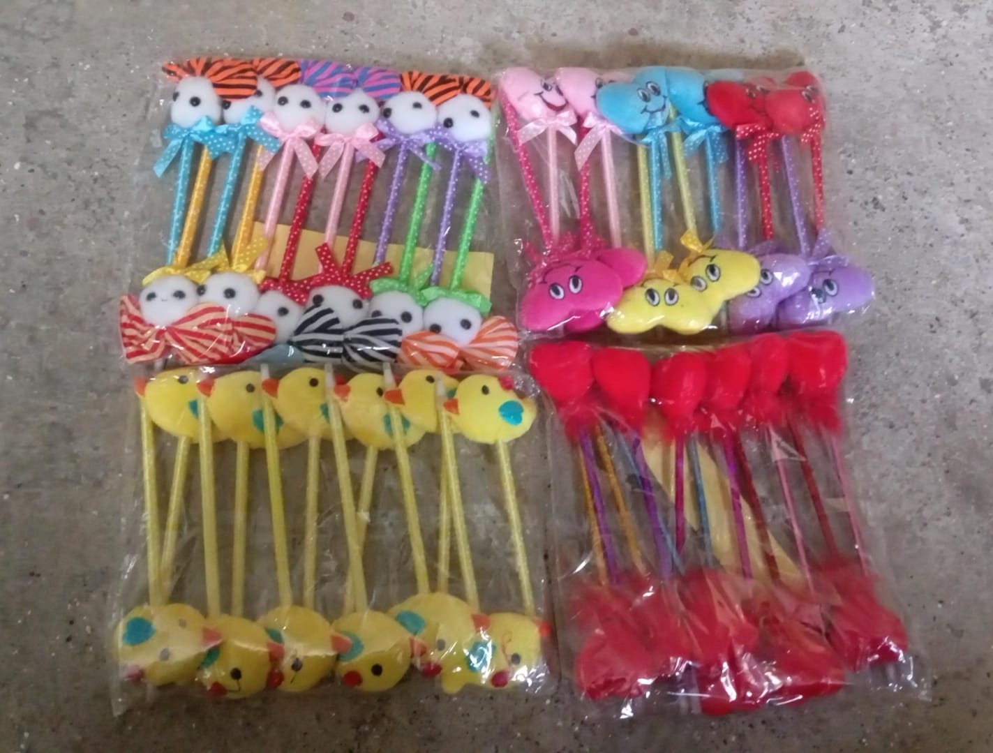 Packaging for the 12-piece mixed design cartoon ballpoint pen set.