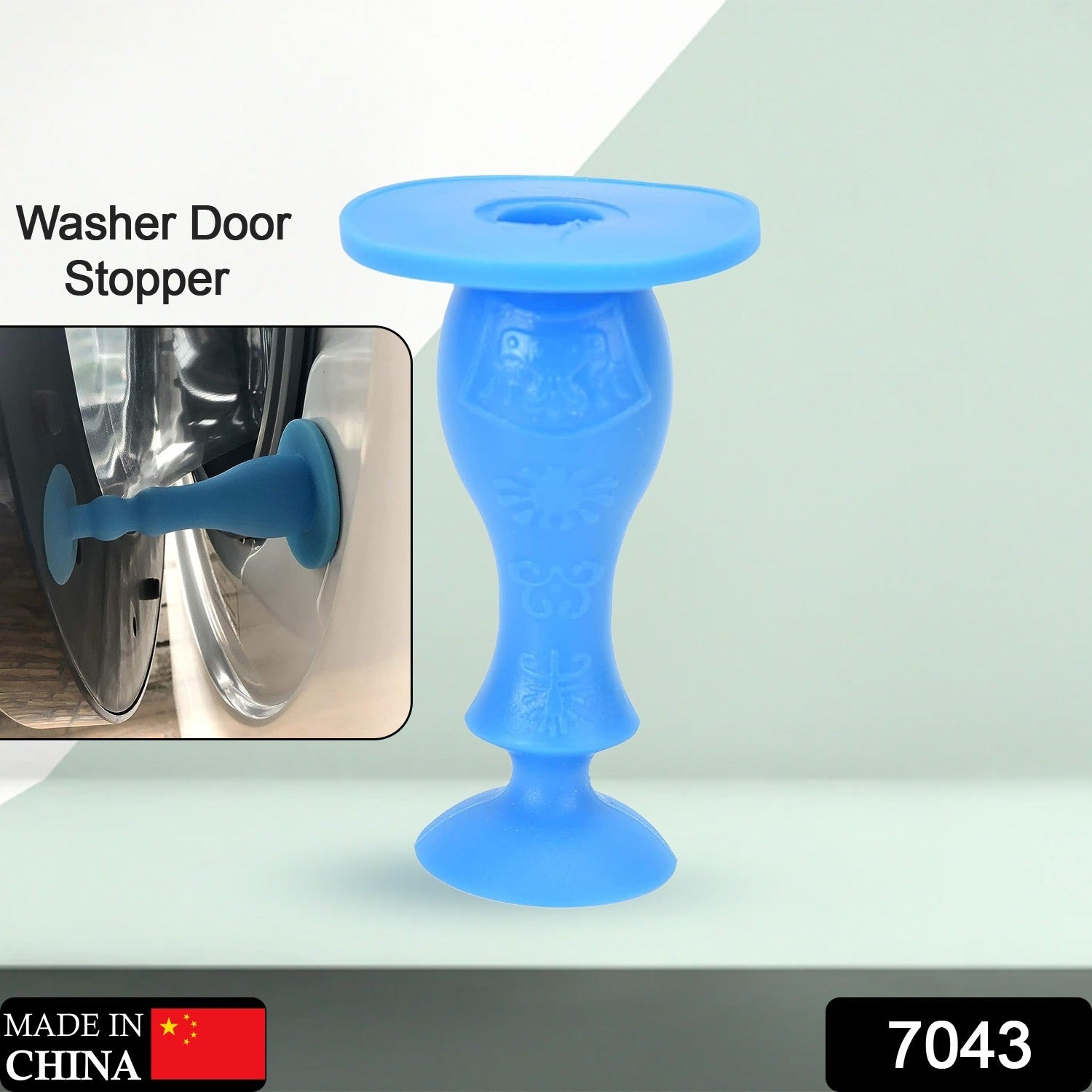 Washer door stopper holding a front load washing machine door ajar for ventilation.