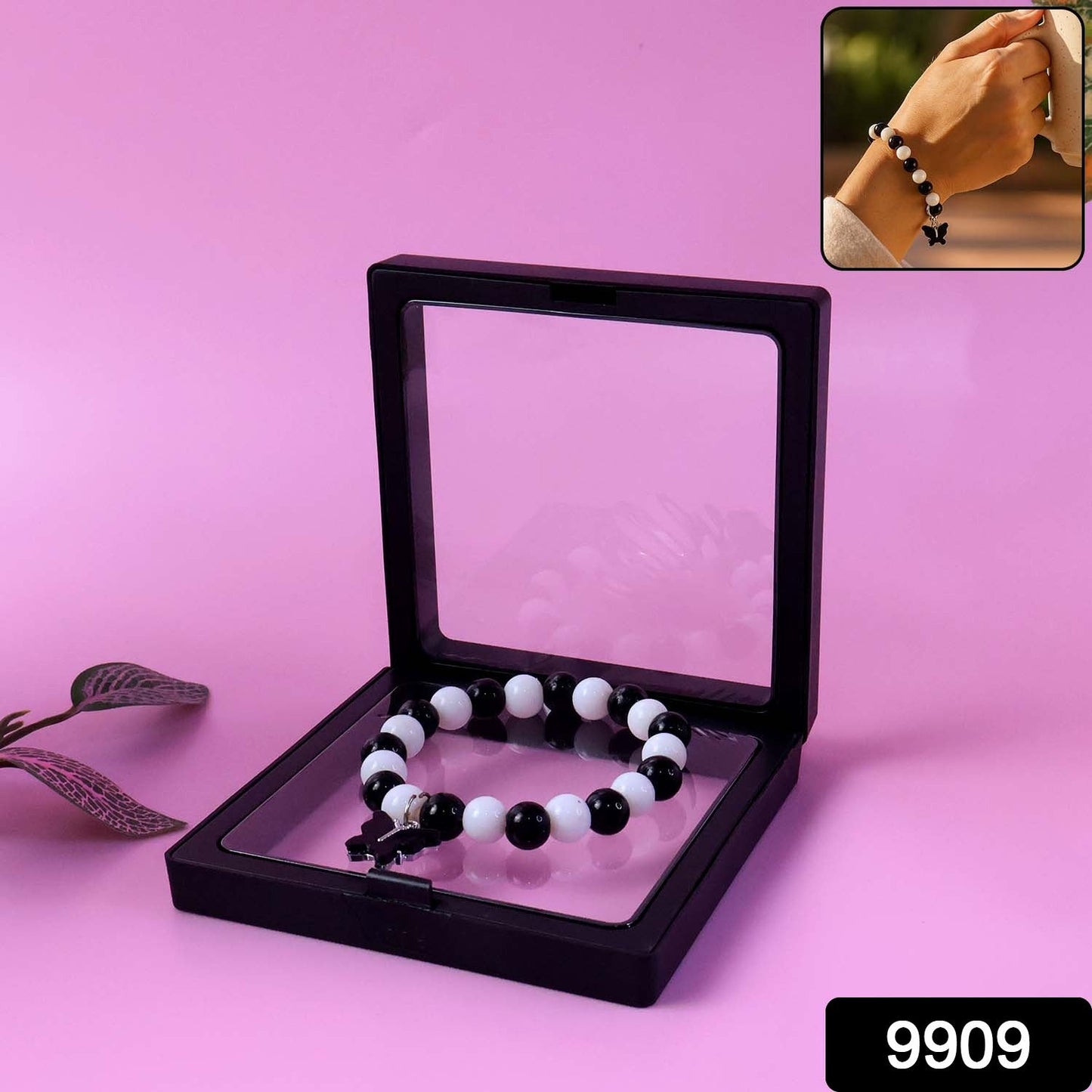 Black and white beaded bracelet presented in sleek jewelry display box