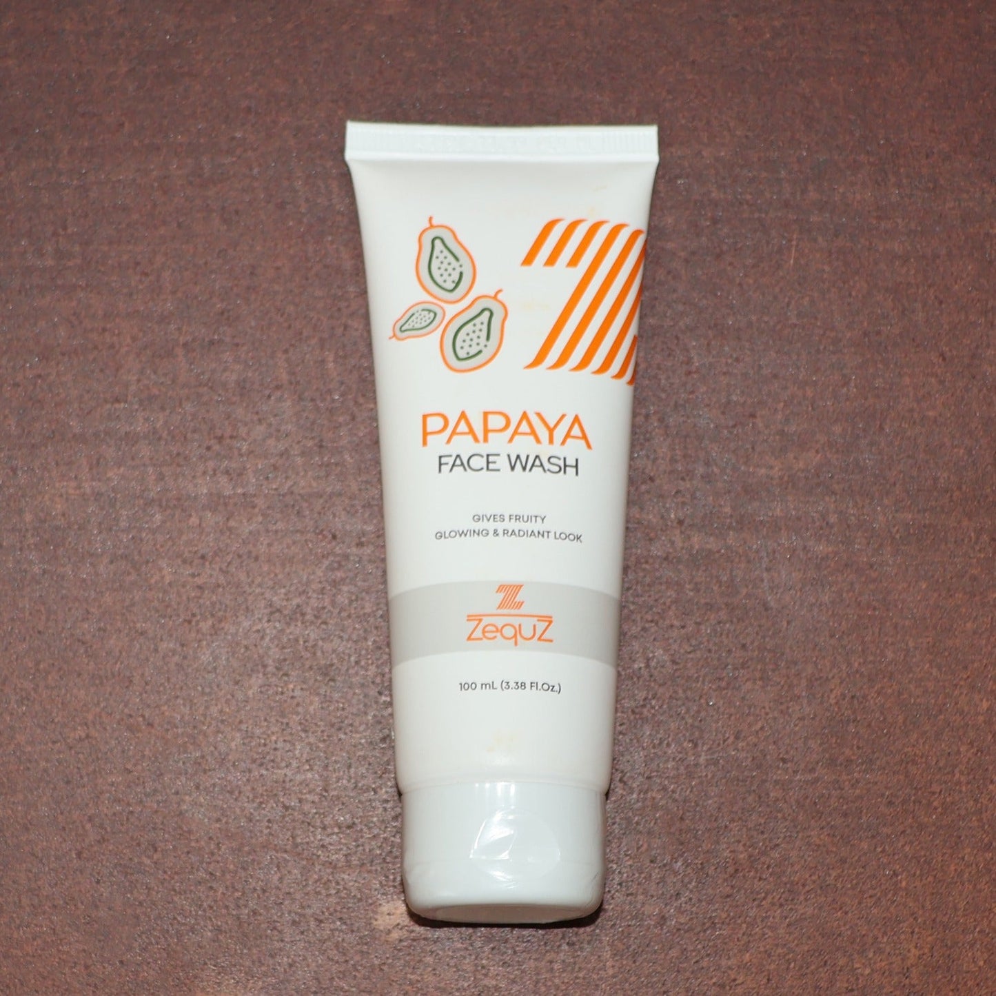 Papaya Face Wash tube shown with clean, dewy skin after use
