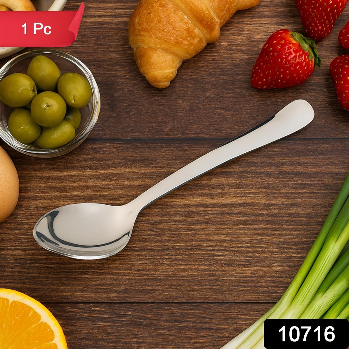 Two mirror-polished Stainless Steel Dining Spoons, highlighting their elegant design.