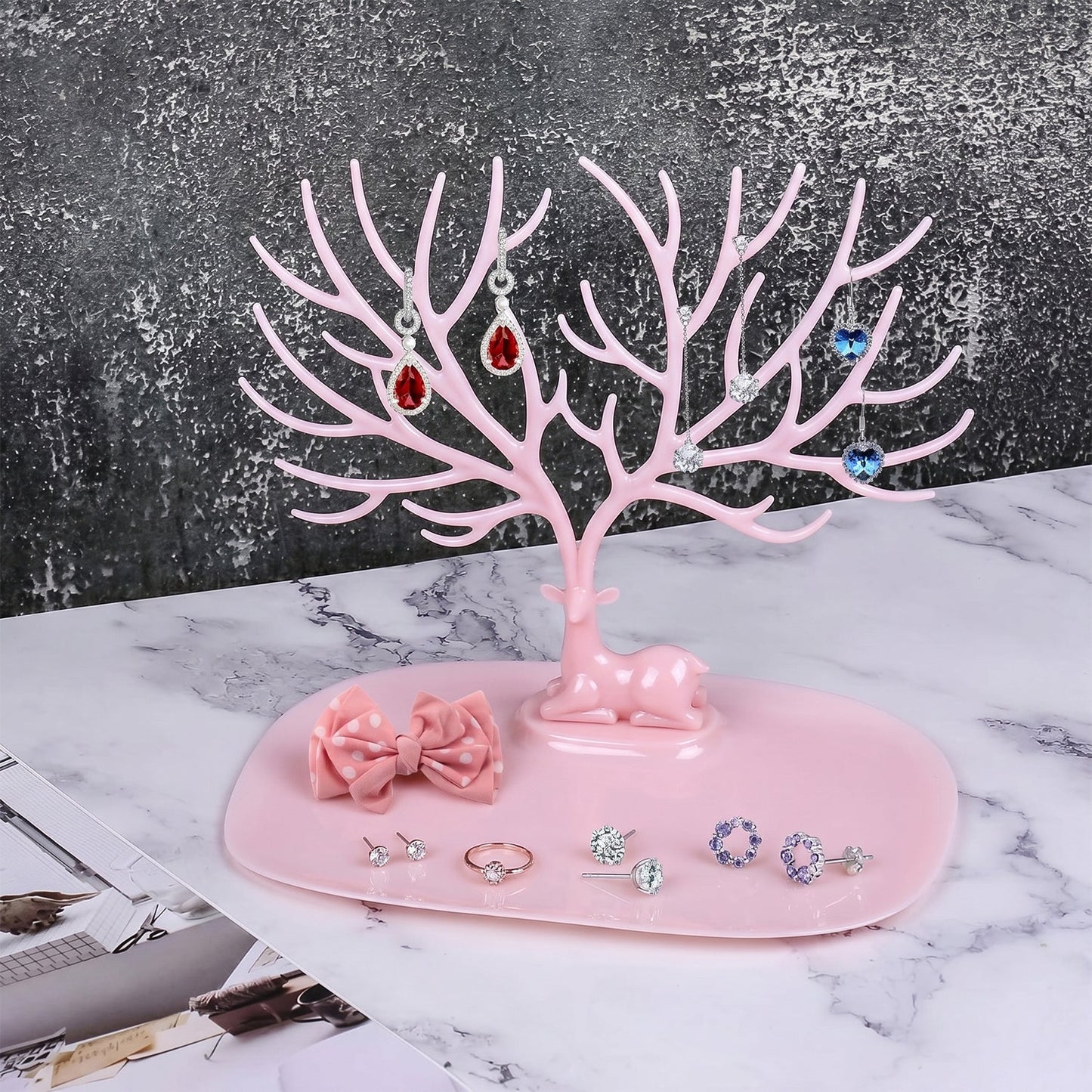 Full view of pink deer jewelry organizer stand, India