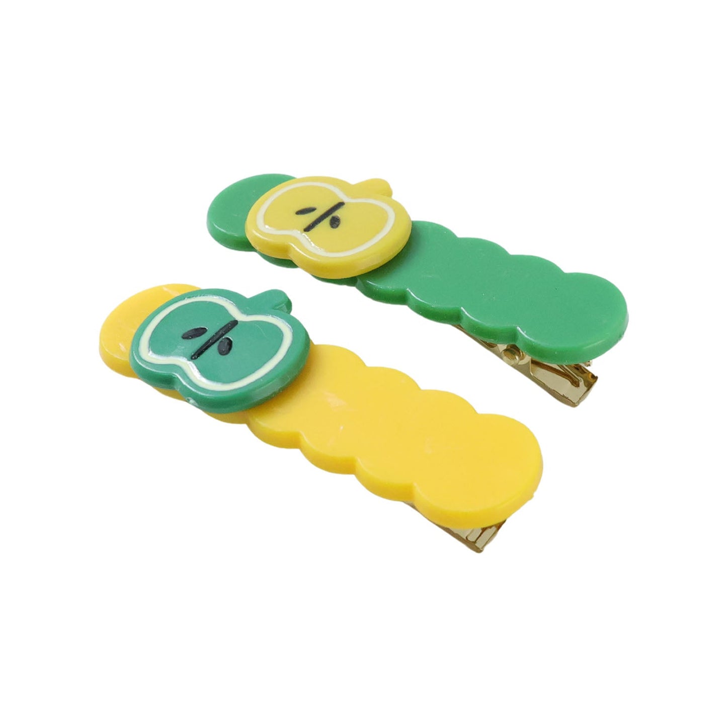 Side view of colorful apple design hair clip holding hair gently