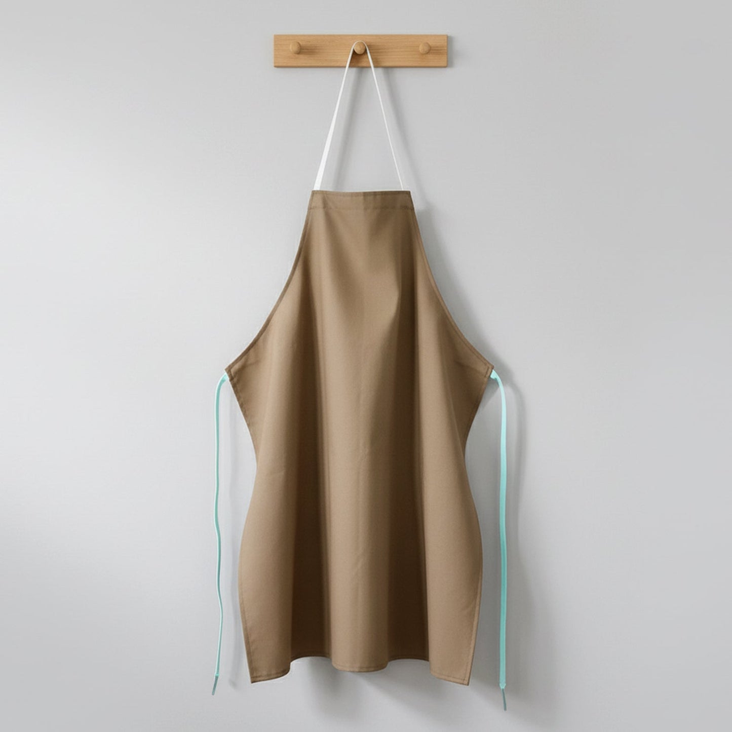 Chef apron shown alongside cooking utensils