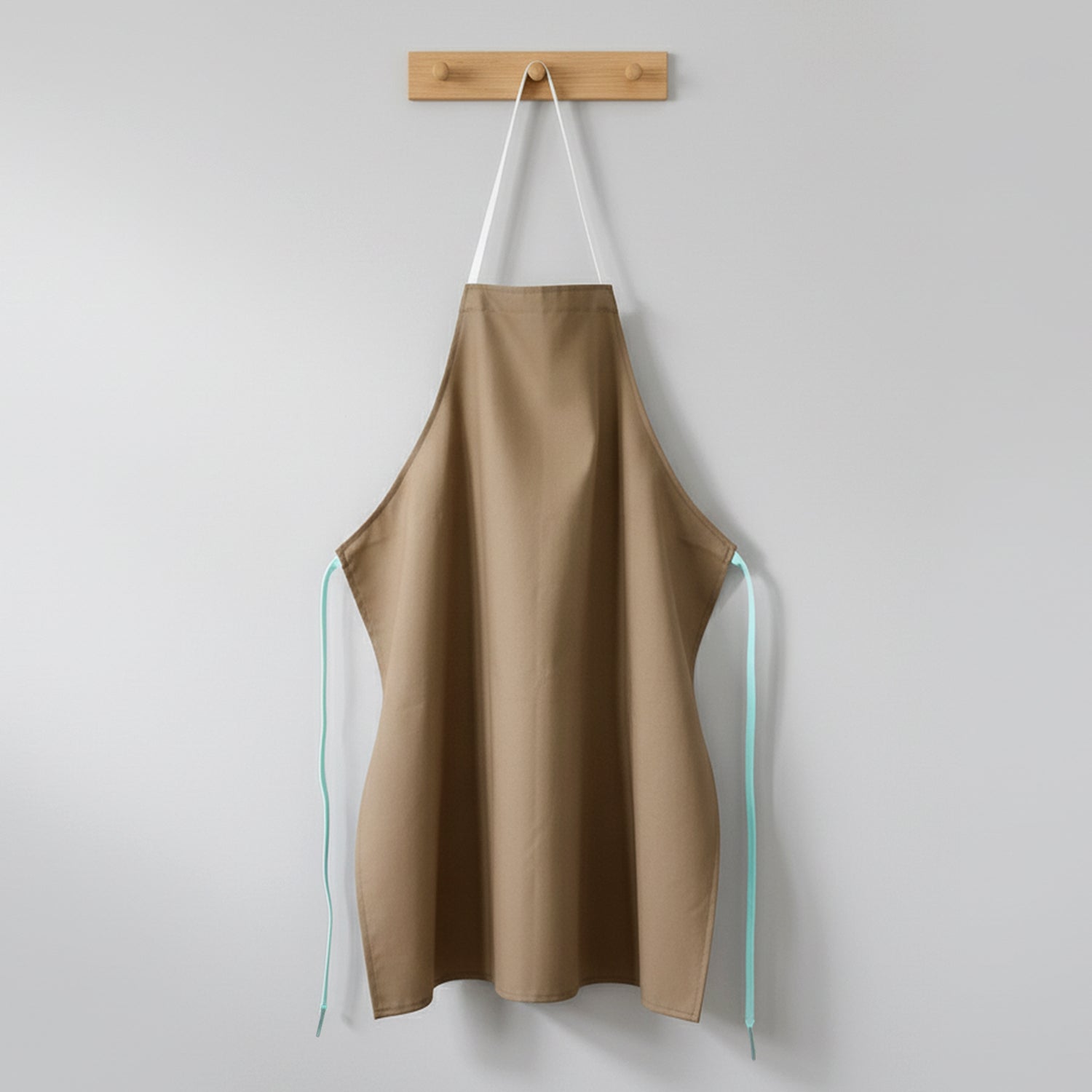 Chef apron shown alongside cooking utensils