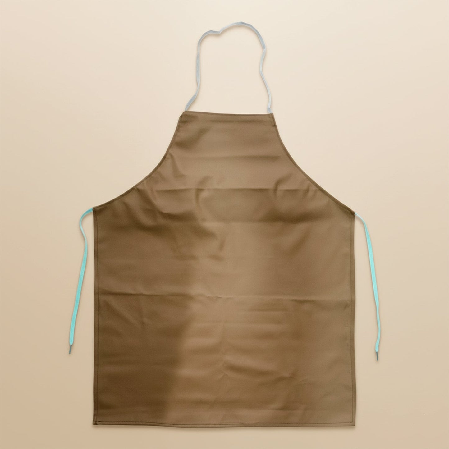 Kitchen apron worn during active cooking tasks