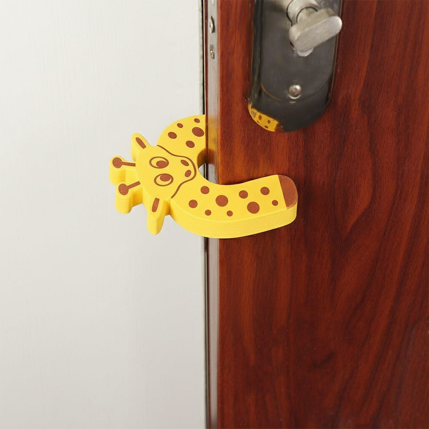 Side profile of the door stopper, showing its low-profile wedge shape.