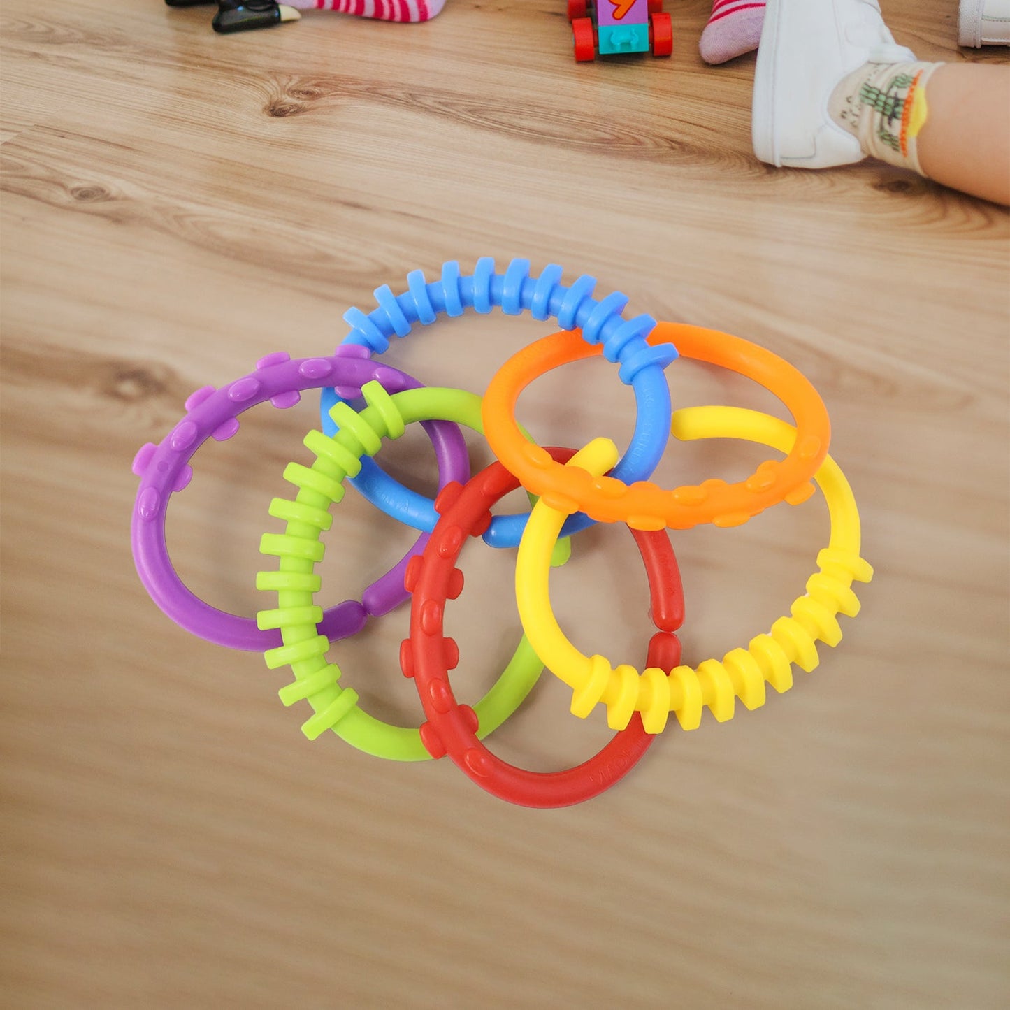 Safe soft plastic baby link toys with sensory textures for teething