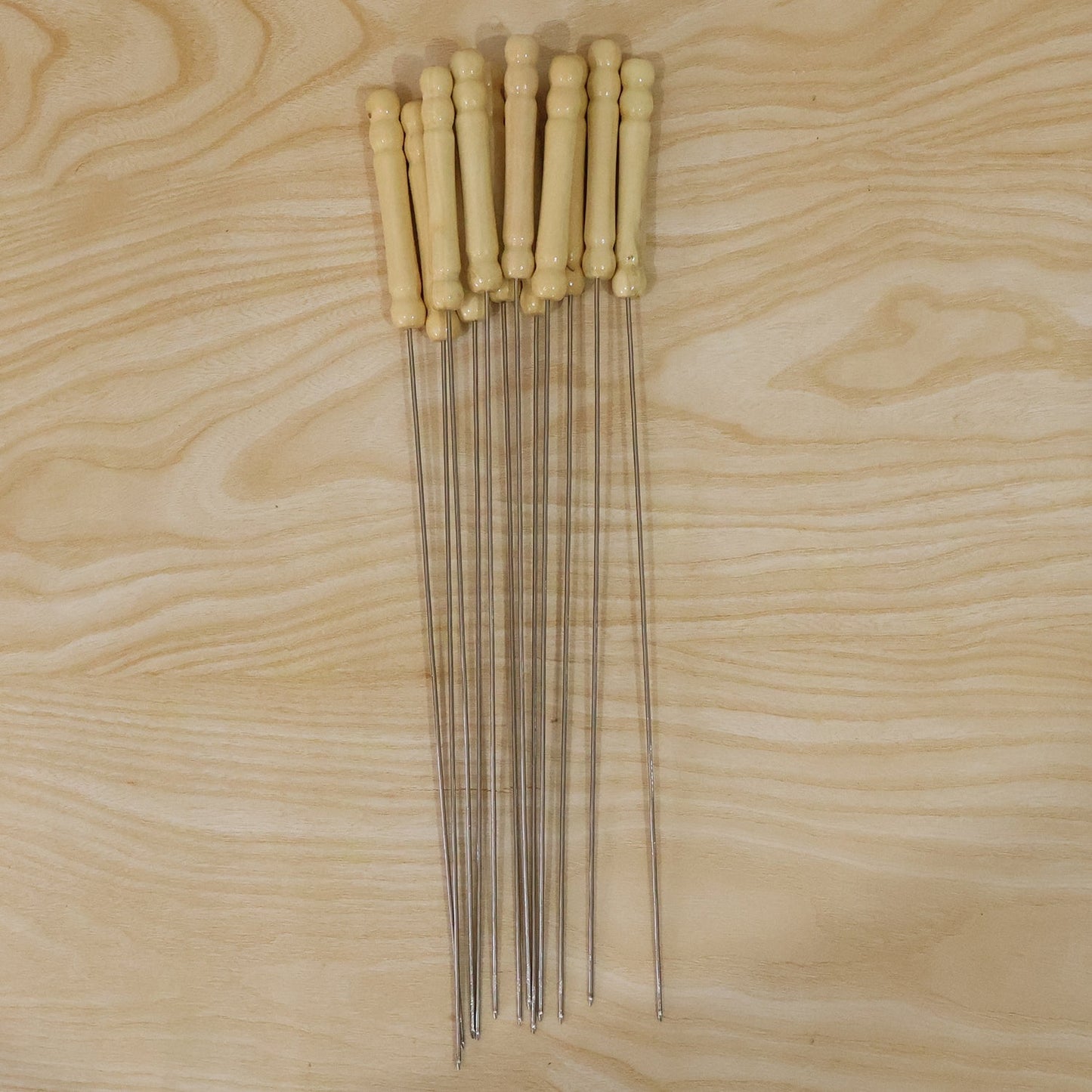 Skewers with stainless steel sticks and wooden handles for grilling cooking