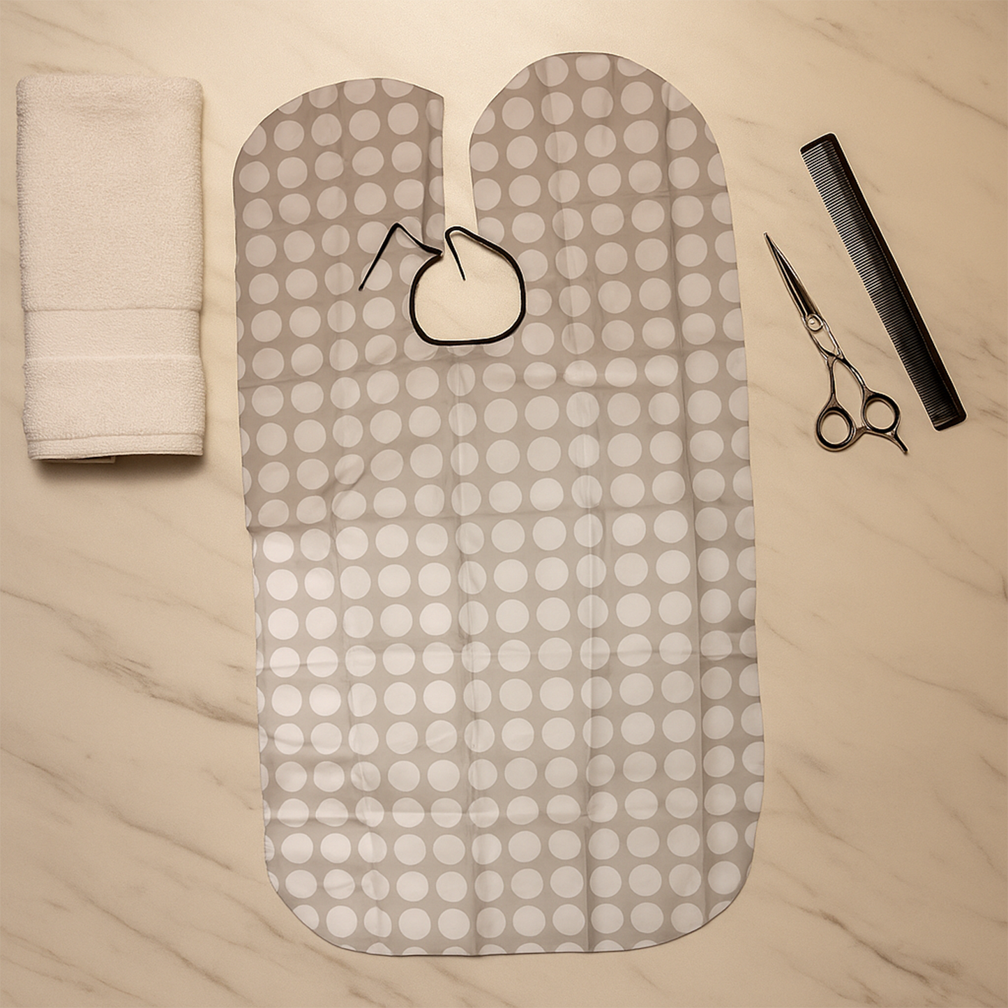 Adjustable neck closure on barber cape for secure fit during hair trims