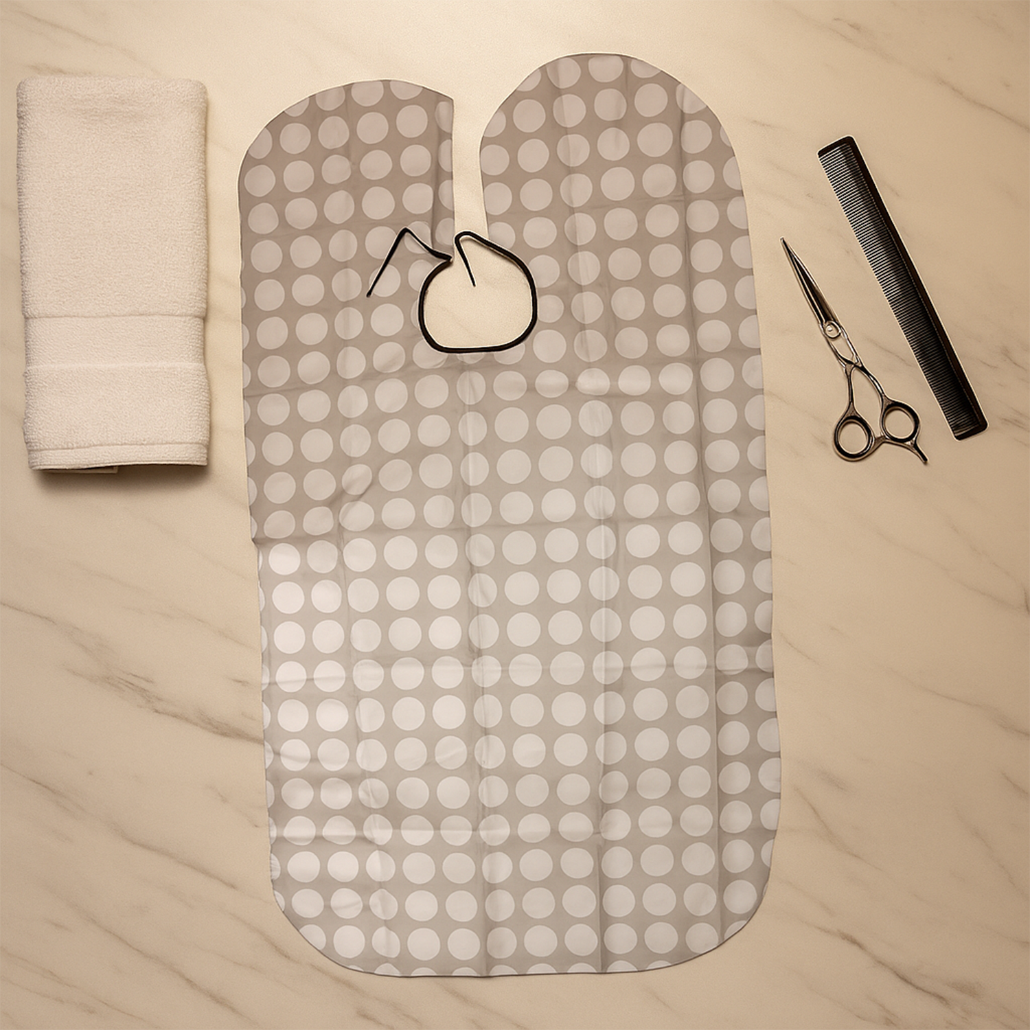 Adjustable neck closure on barber cape for secure fit during hair trims