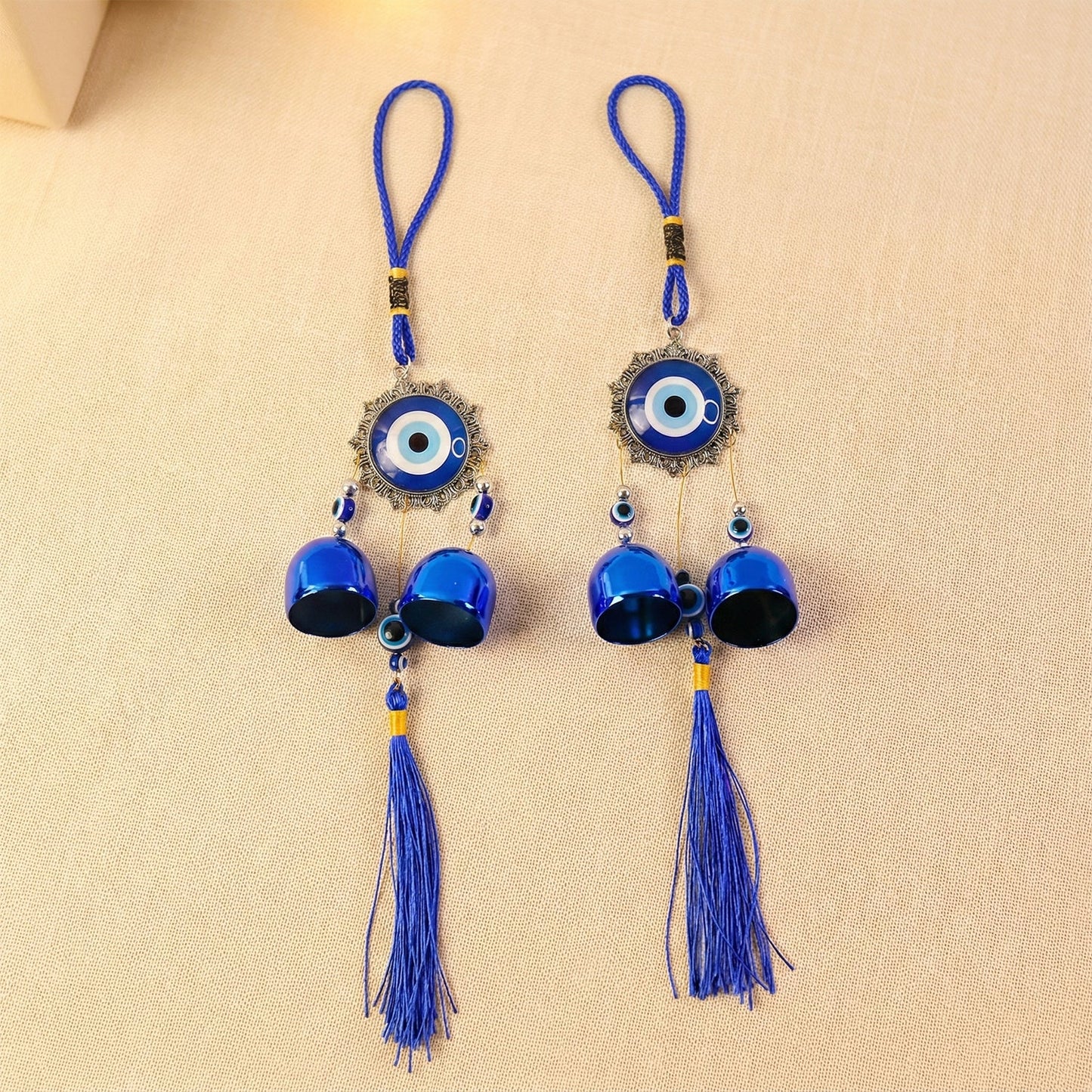 Decorative hanging evil eye wind chimes with bells and tassels
