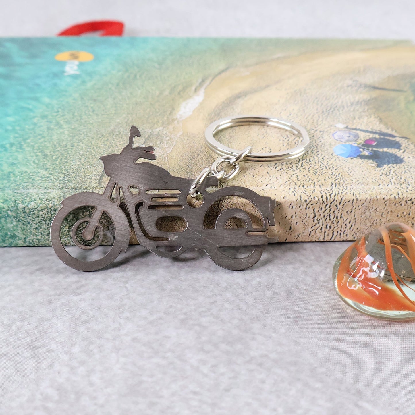 Sleek motorcycle silhouette metal keyring, perfect for bike keys and enthusiasts.