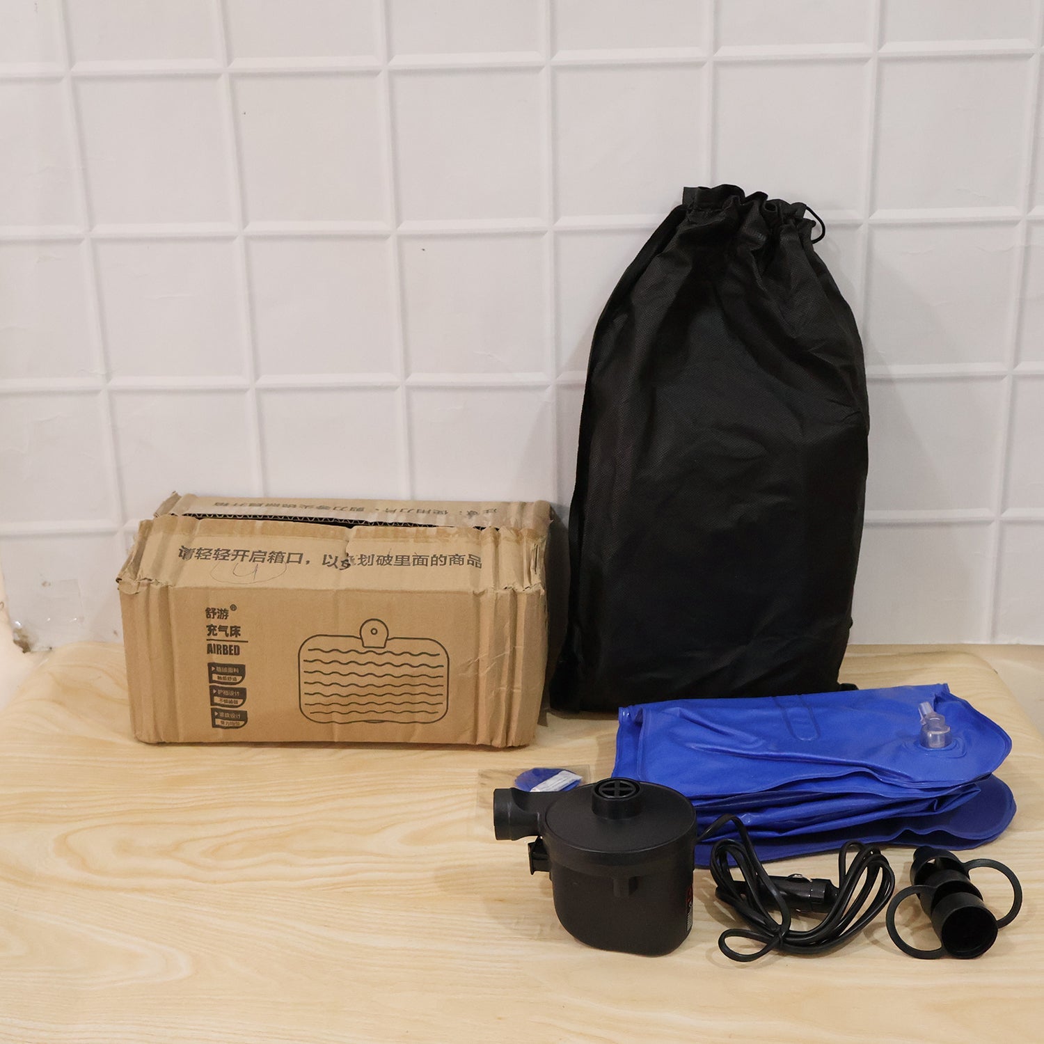 Foldable and portable inflatable car bed for travel