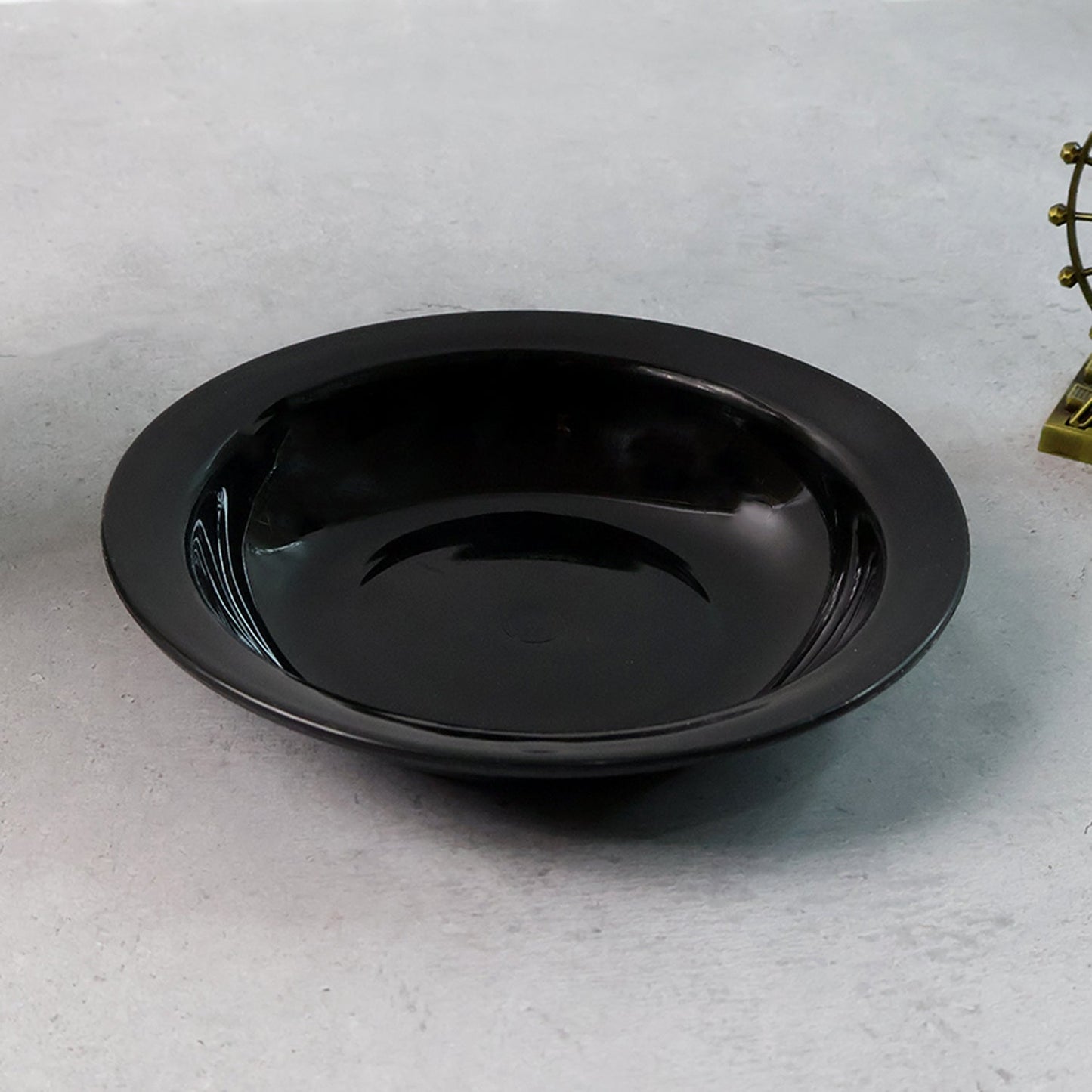 Deep glossy black soup bowl ideal for hot and liquid meals