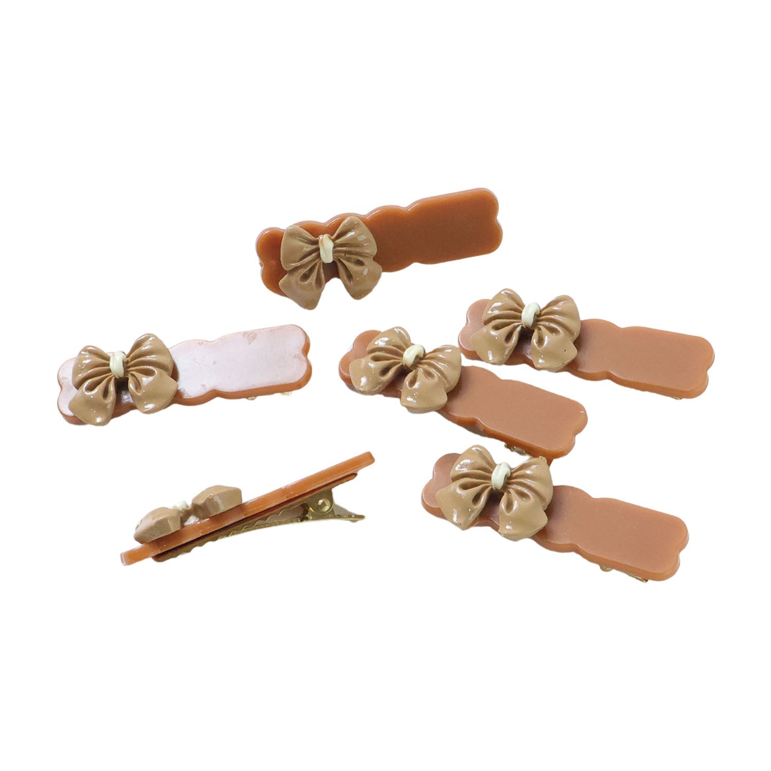 Collection of minimal solid-tone bow hair clips for women