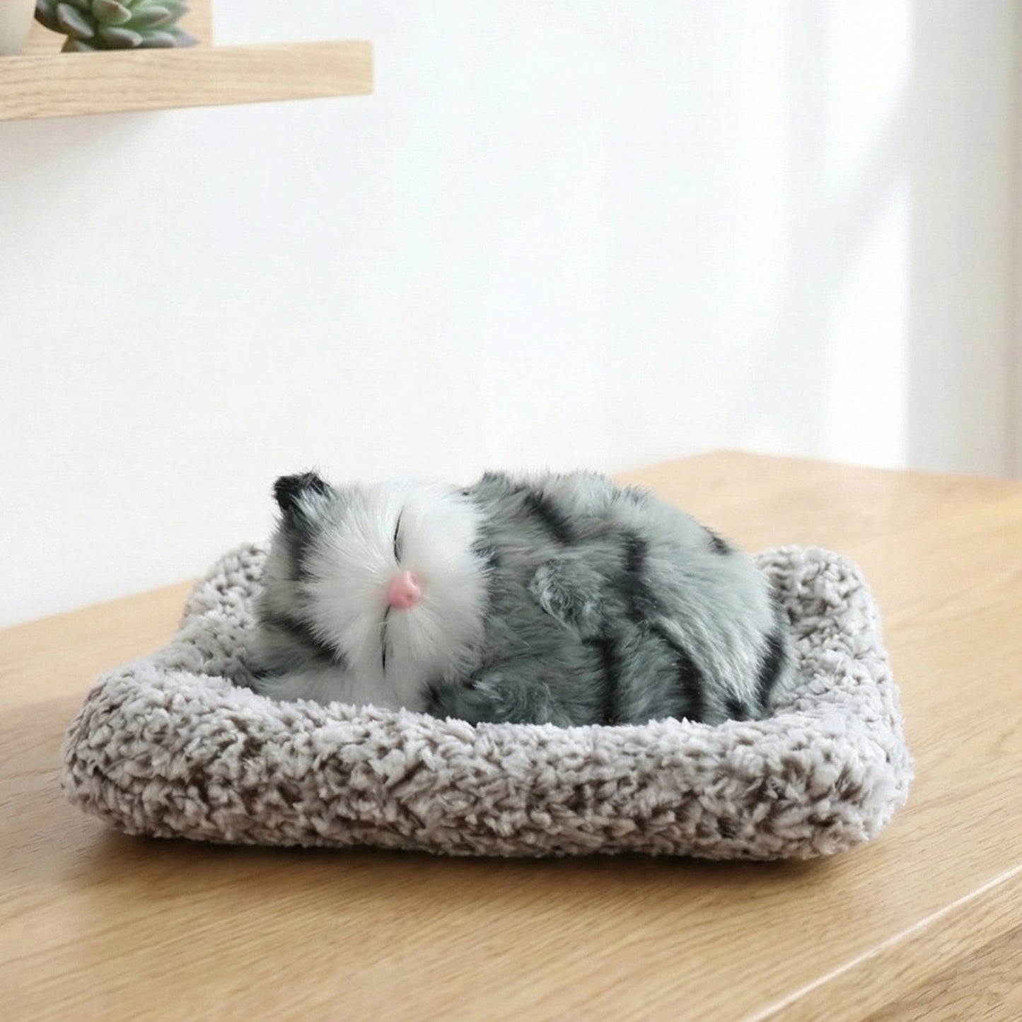Dashboard soft cat plush figurine adding warmth to car interior