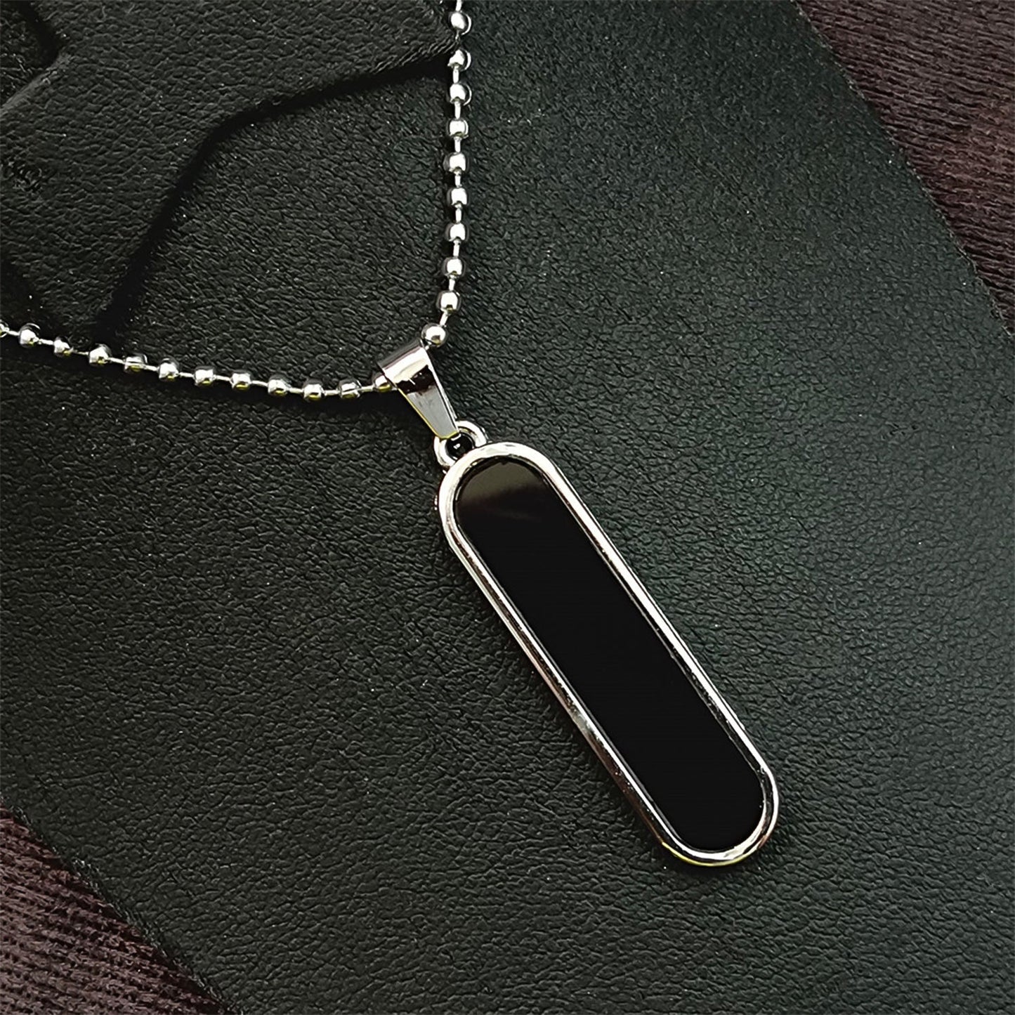 Stylish minimalist necklace pendant with polished metal finish