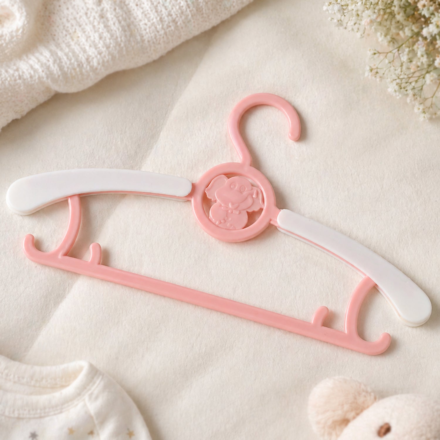 Space-saving lightweight plastic hanger for kids wardrobe