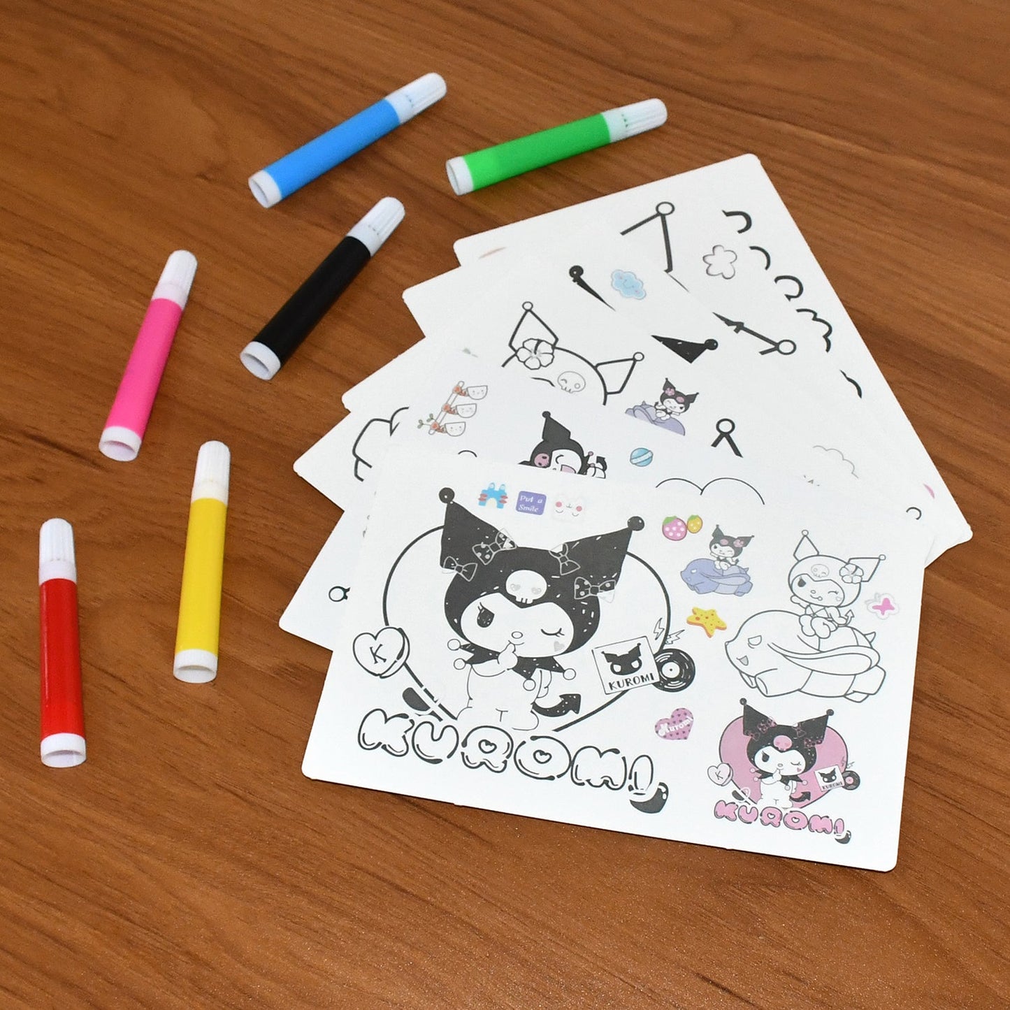 Kids coloring book set with Kuromi theme displayed on white background