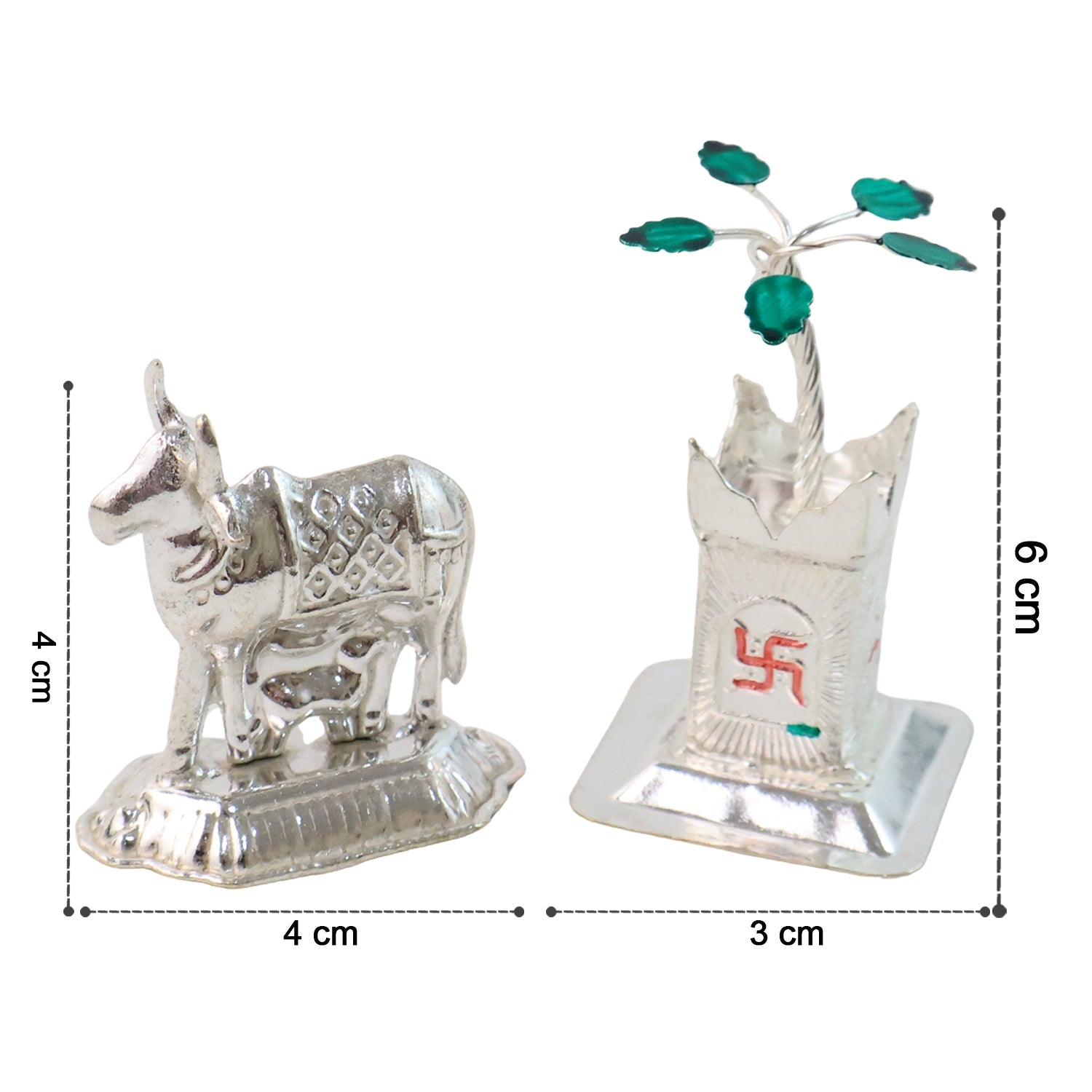Silver-plated Kamdhenu cow and Tulsi plant pooja idols enhancing home spiritual decor