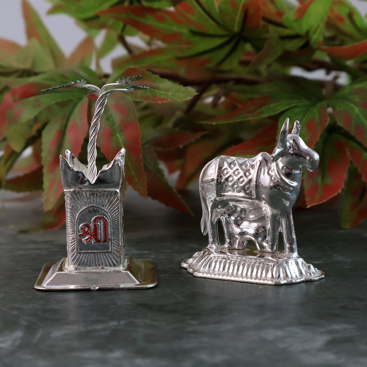 Elegant silver-plated Kamdhenu cow and Tulsi plant pair for religious blessings