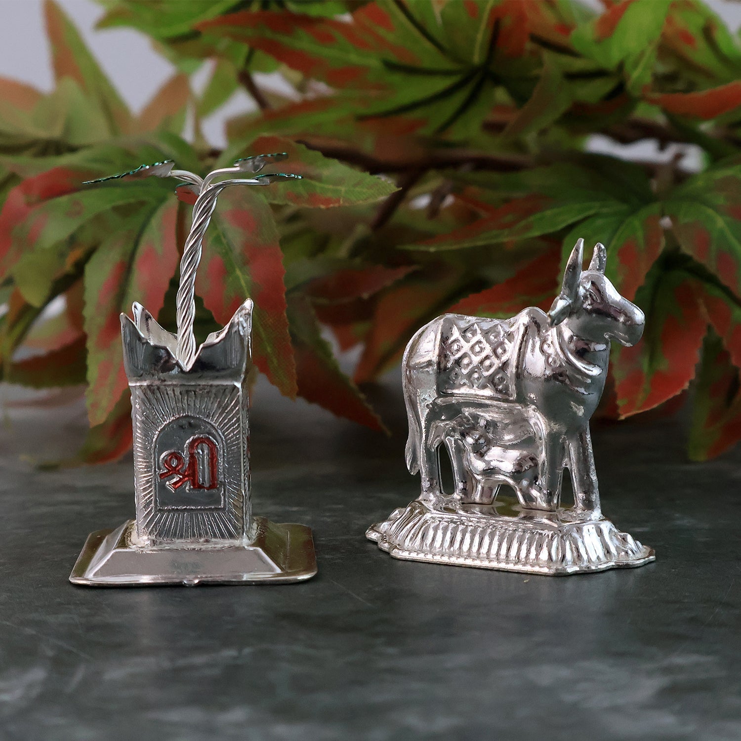 Elegant silver-plated Kamdhenu cow and Tulsi plant pair for religious blessings