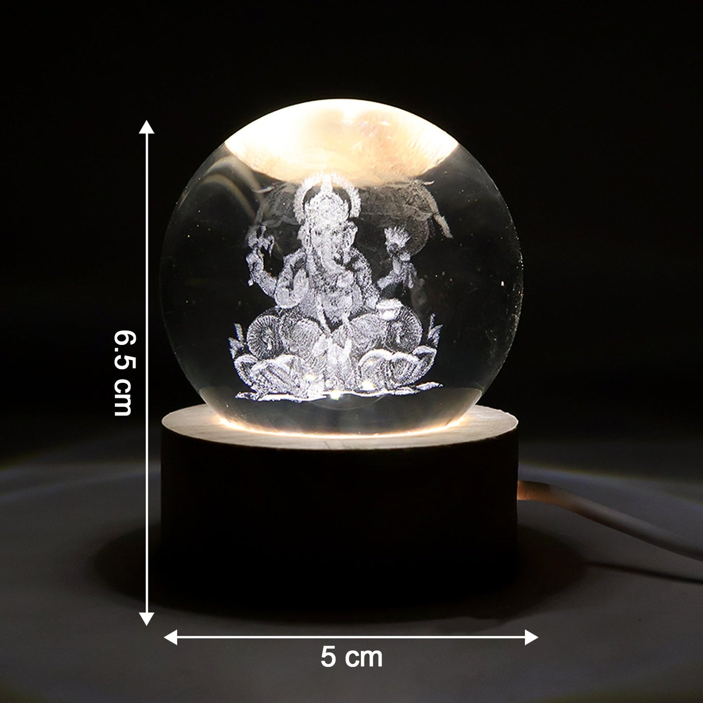 Ambient glow of the Ganpati 3D Crystal Ball Lamp, perfect for spiritual home decor.
