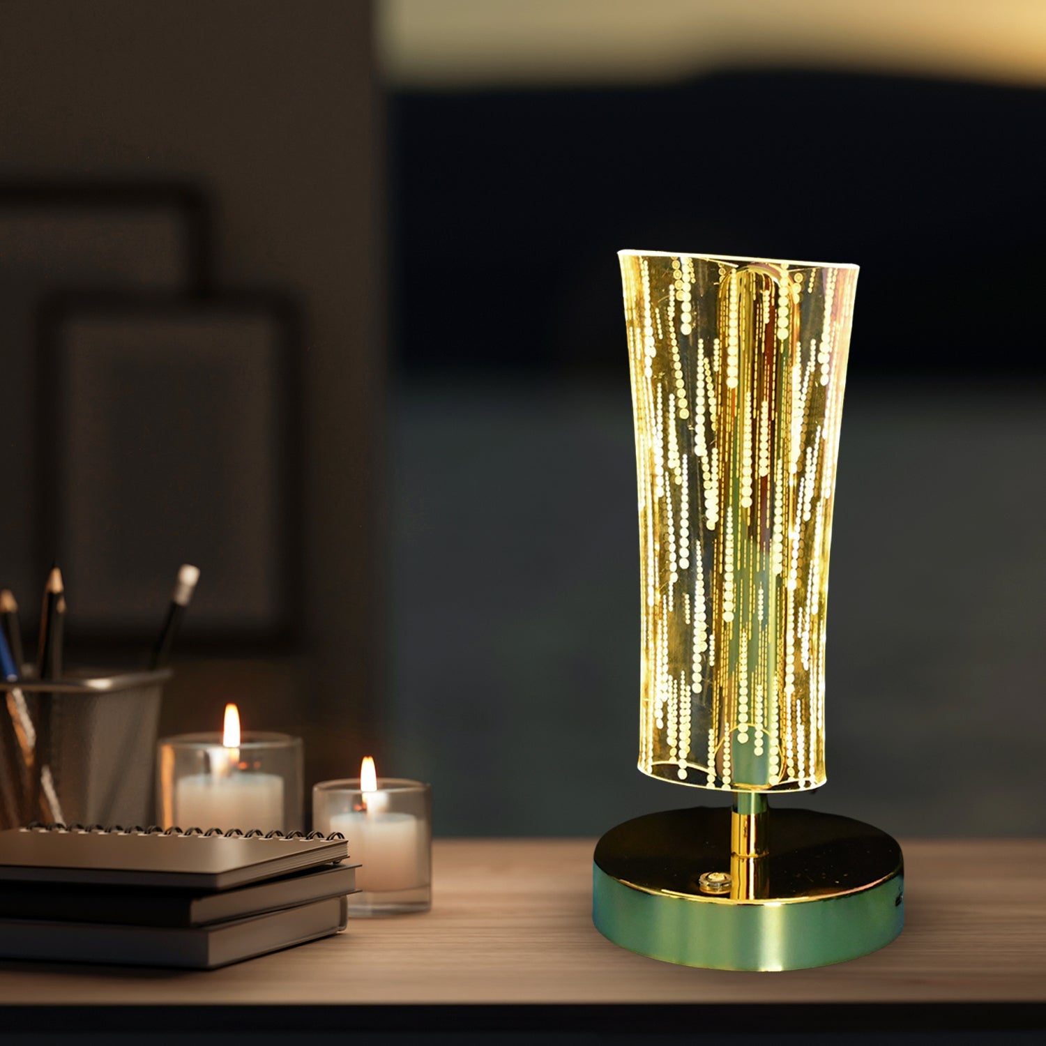 Close-up of crystal table lamp showing detailed LED light effect and golden base
